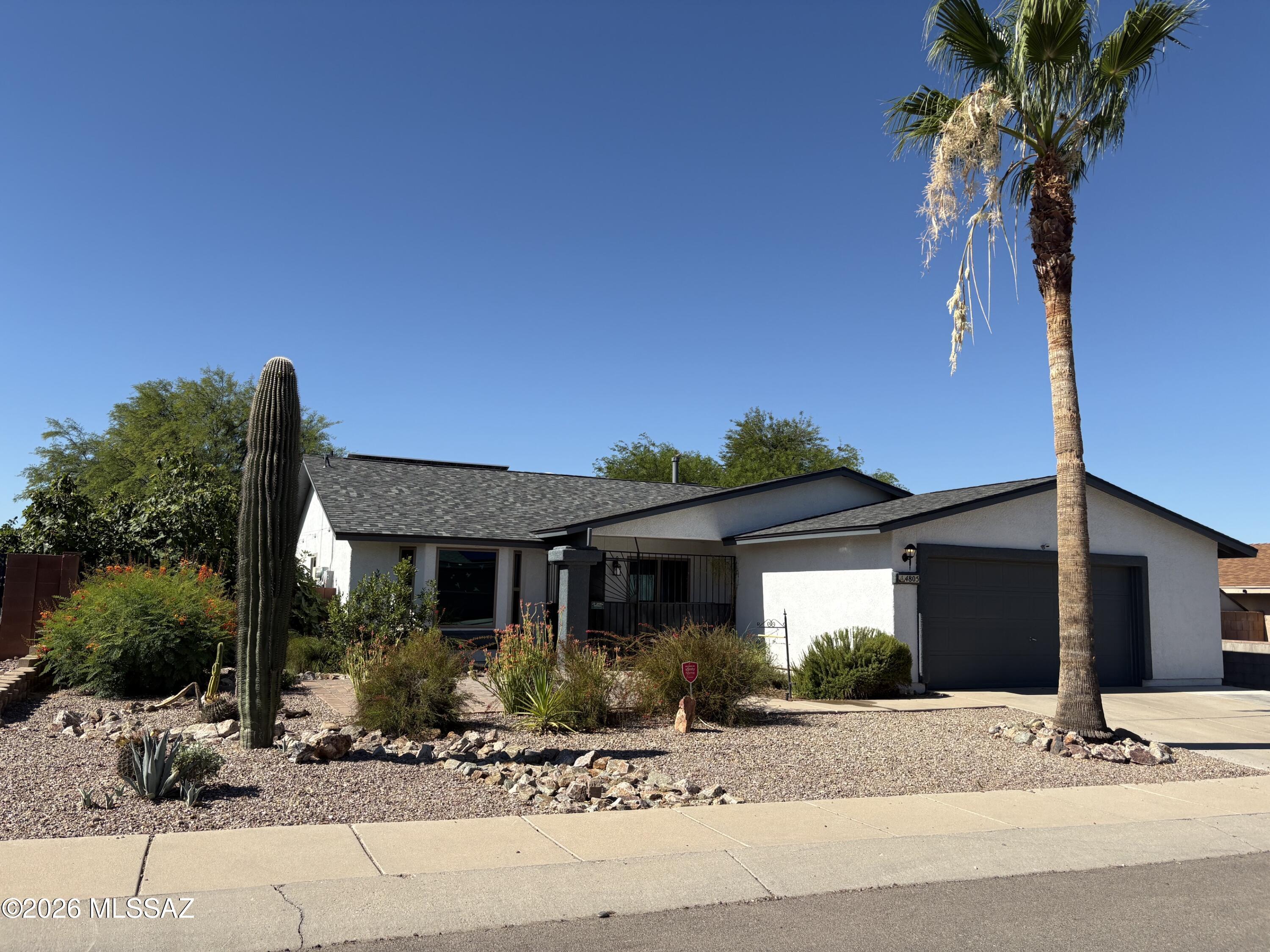 Beautifully updated 4 bedroom 2 bath home in great Marana neighborhood close to school and park.  Freshly painted, newer appliances hot water heated and AC.  SOLAR panels bring electric costs down dramatically.

Ceramic tile, Luxury Vinal, and 1 bedroom with carpet.

Updated kitchen with island, French door refrigerator, oven that works as an air frier and cook top with a griddle.

Easy I-10 access, close to shopping, restaurants, banks and more.

Primary bedroom as double closets, barn door to gorgeous remodles bath.

Great rear yard with covered patio, trees, garden areas, artificial grass and built in in grill.