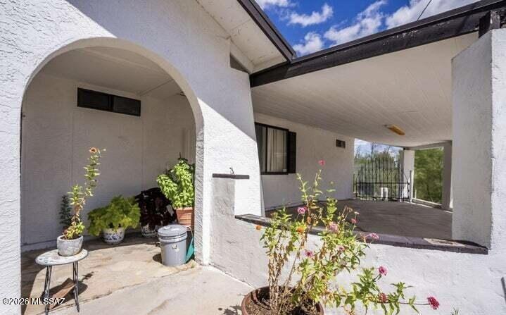 This midtown home is located less than 5 minutes away from Holy Cross Hospital, Nogales International Border, HWY I-19, supermarkets, and restaurants. This home has an open floor plan where dining and living areas are shared. A spacious kitchen, two car carport, covered patio, large storage room, and an enclosed side yard!