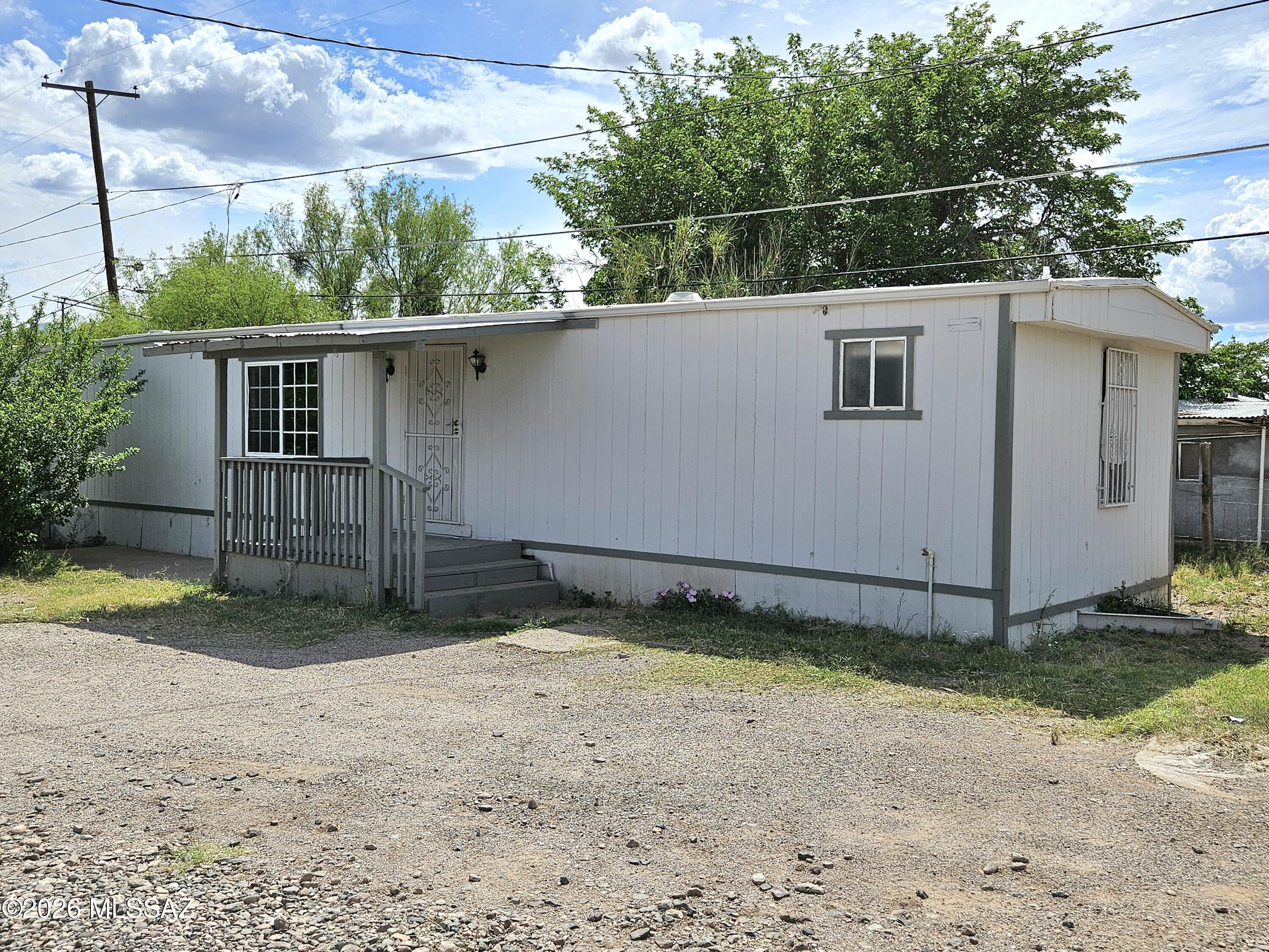 Move in ready, cozy home in a quiet neighborhood. Some nice updates. Newer stainless appliances. Mature trees offer cool and shade. Covered front deck. Metal storage shed. On a rented lot. Great value! Come see this one today!