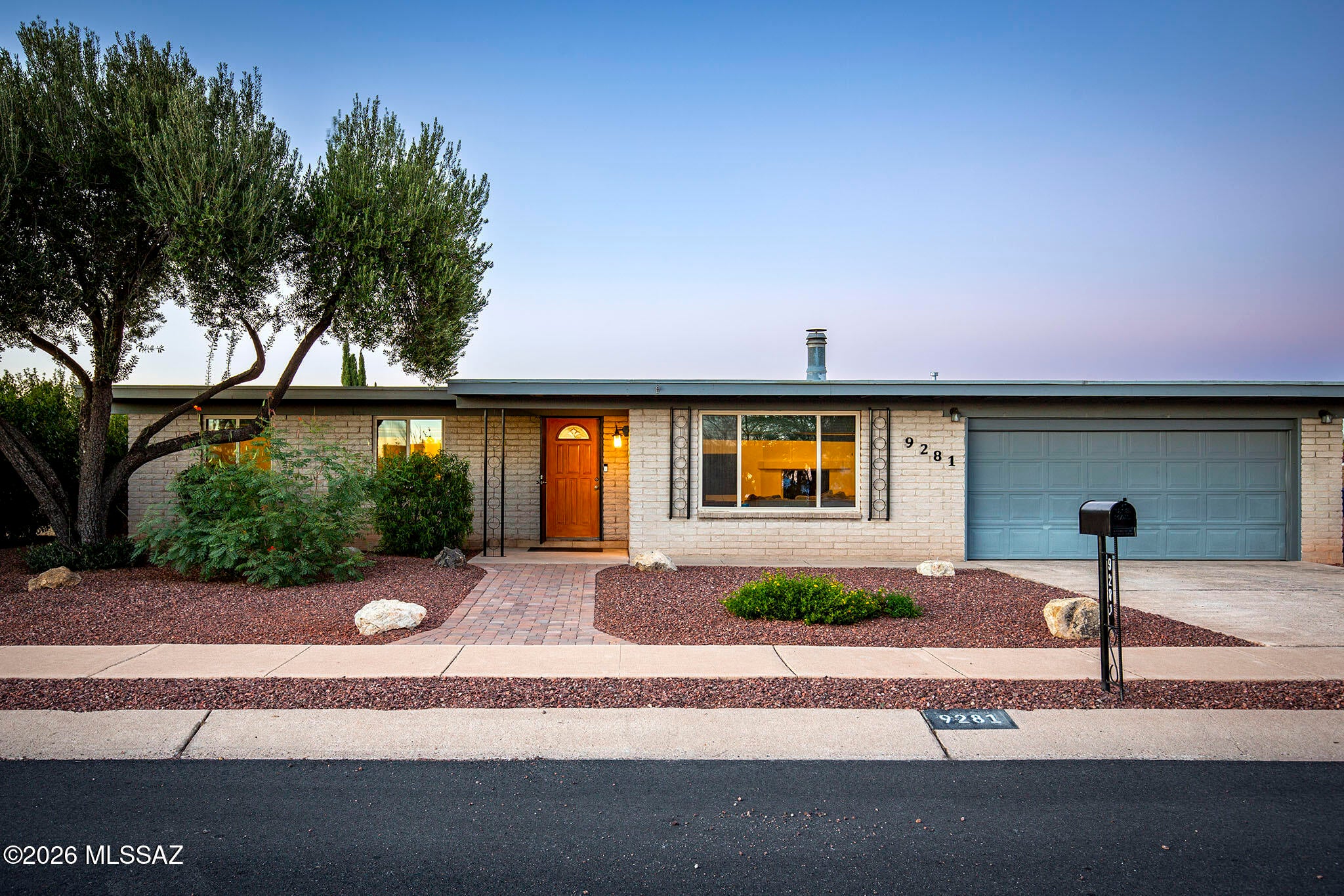 Unobstructed Catalina Mountain views and a private backyard pool take center stage at this three-bedroom, two-bath east-side home. The walled backyard offers privacy, a covered patio for relaxing, and plenty of space for poolside entertaining. Rear alley access provides convenient RV or camper storage. Inside, the freshly painted interior features fireplace in the living room, recessed lighting and a new kitchen stove. The refinished laundry room, located just off the enclosed garage, also adds valuable storage space. This home is ready for its next owner to enjoy.