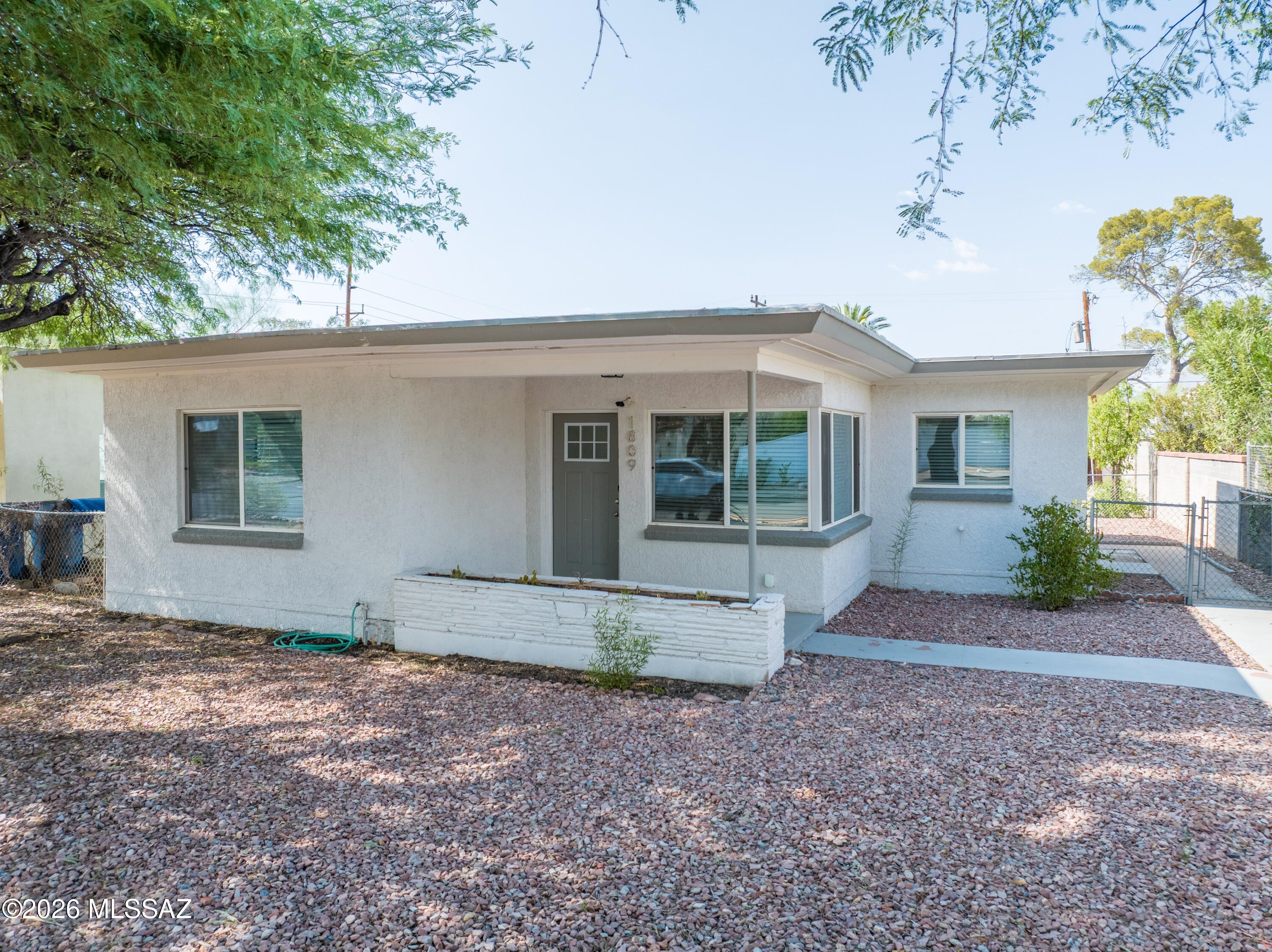 Welcome to the Jefferson Park subdivision. This is an exceptional updated 4 bedroom, 2 bath home on a good size lot with plenty of parking in the rear for up to 4 cars. It offers stainless steel appliances, quartz counters in kitchen and baths, newer roof, newer AC, 2 mini splits and new carpet in 3 bedrooms. All this and within minutes to the U of A and University Hospital. It would a great rental for U of A students. Enjoy nearby restaurants and downtown is within minutes. Don't miss your chance to own this very nice home in a great location. Seller's offer up to $8k in concessions to a financed, qualified buyer with an acceptable offer.