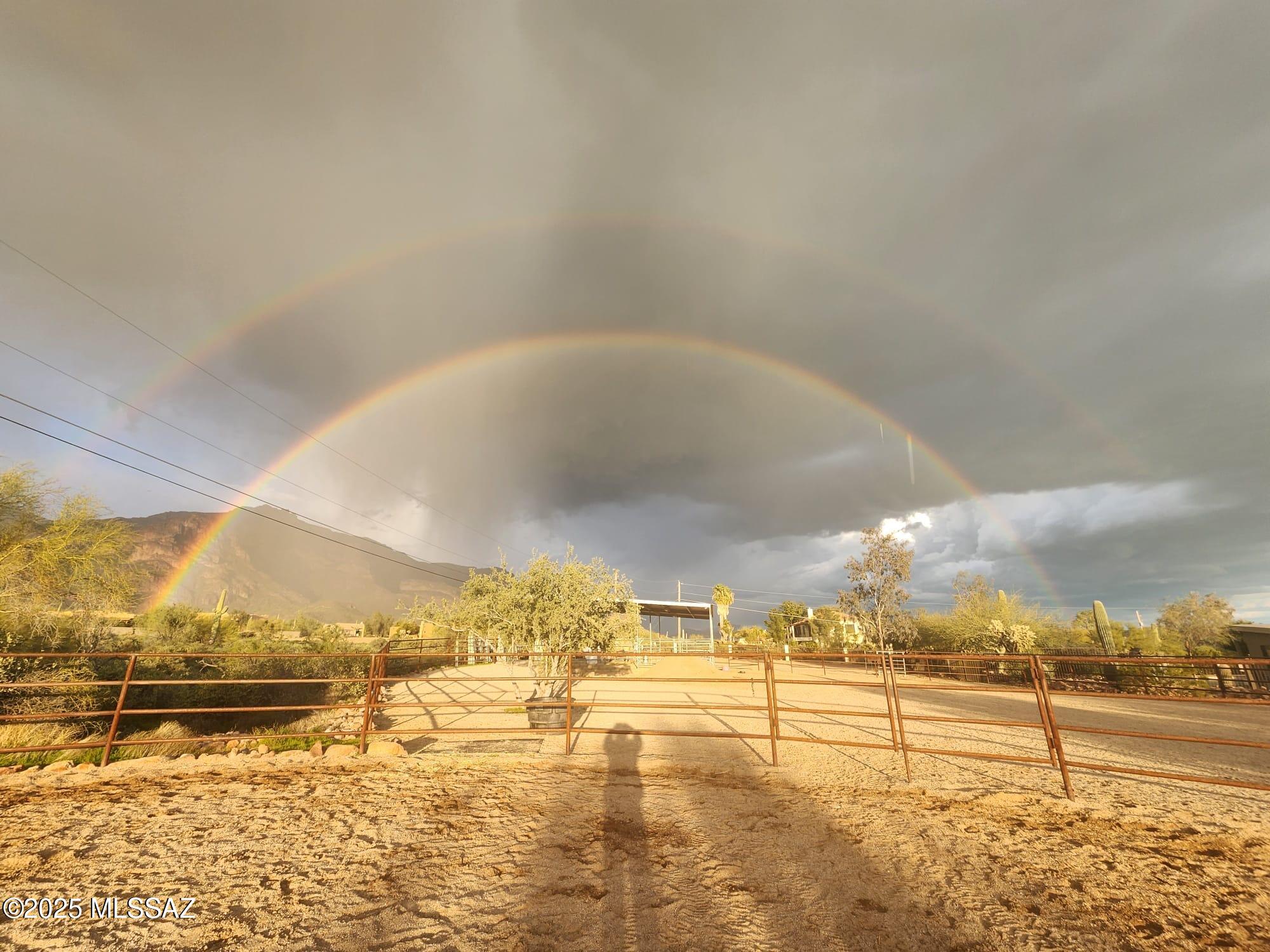 Fully fenced 40+ Acre Horse Property w/Stunning Panoramic Mountain Views. Unobstructed Sunrise & Sunset Views. Located in the Foothills of Kitt Peak & the Coyote Mountains Wilderness area. Cozy 3 BR 2 BA home w/large extended covered patio. 2 Wells (1 Shared w/neighboring property) 2 Septic Tanks (1 in use). Previously 2- 20 Acre properties. Complete w/Horse Facilities & Plumbed water to the troughs. 6 Stalls, & 3 Separate fenced Pastures (E side 6 Ac, W 12 Ac, S 1 Ac). Beautiful Arena. NEW 12 x 24 Tack Shed. Workshop and Storage shed to boot. Huge firepit area w/overhead lighting for social gatherings. This is truly Ranch Life at its Best! Abundant Wildlife, Range Horses & Steer makes you feel like you've stepped back in time. Gitty up on over to this Serene Desert Home.