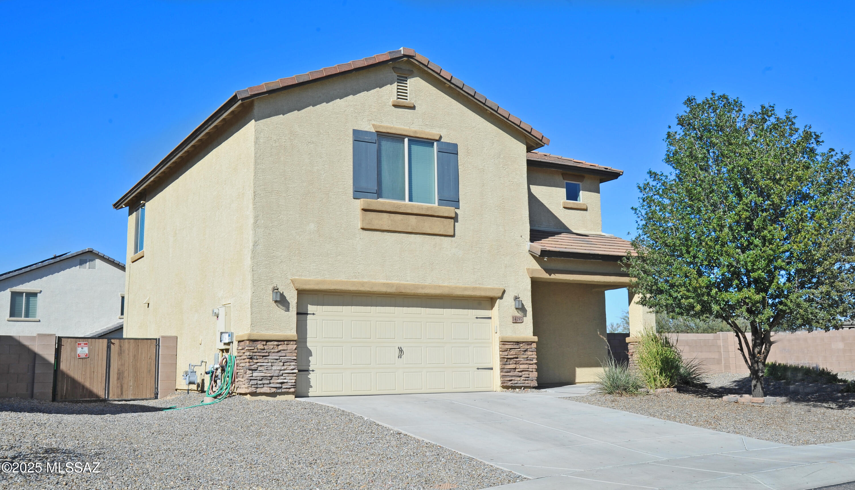 Range Price 350,000-360,000. Welcome to this beautifully maintained 4-bedroom, 3-bath home built in 2017 and situated on just under a quarter-acre lot. With over 2,000 sq. ft. of living space, this home offers an open floor plan that connects a spacious family room to a gorgeous kitchen featuring granite countertops, custom cabinetry, an undermount sink, spray faucet, an island with seating for four, a walk-in pantry, and newer stainless steel appliances including a gas range, built-in microwave, and dishwasher. The master suite includes dual sinks, a relaxing garden tub, and a walk-in shower. New carpet and ceiling fans throughout add comfort and convenience. A large walk-in laundry room comes complete with a washer and dryer. . 2-car garage and a concrete driveway that provides extra parking