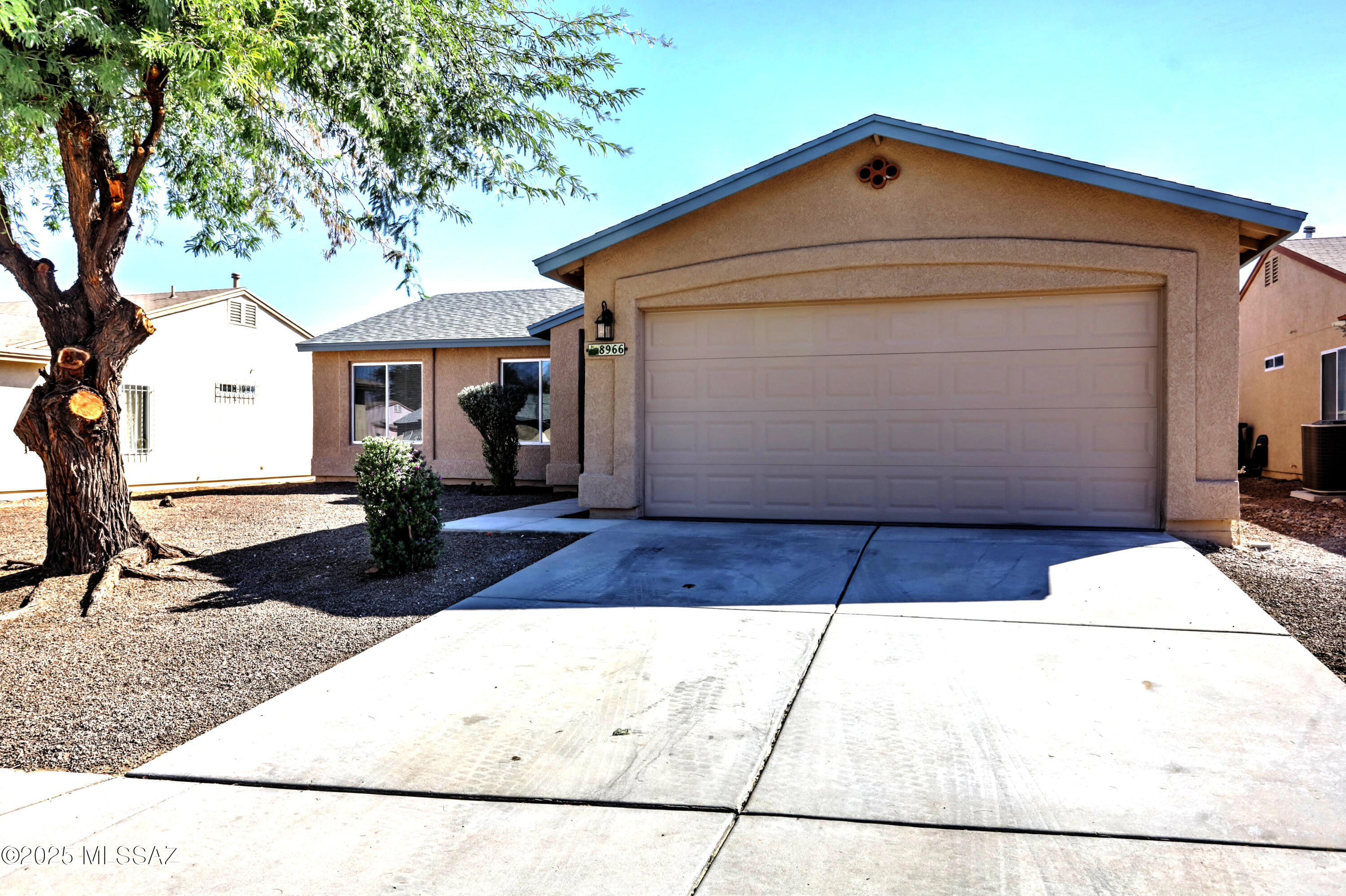 Welcome home to this beautifully updated 3-bedroom, 2-bath gem offering 1,372 sqft of comfortable living space. Step inside to discover a bright, open layout featuring new kitchen quartz countertops, a stylish new sink and a charming bay window that creates the perfect breakfast nook. Freshly painted inside and out, this home boasts new carpet in the bedrooms, new tile in wet areas and luxury vinyl plank flooring in the living room and hallway. Both bathrooms have been updated with modern finishes and new fixtures. Enjoy updated lighting throughout, a dedicated laundry room and a 2-car garage with fresh epoxy flooring. Relax outdoors under the covered patio overlooking a spacious backyard  -a blank canvas ready for your garden or personal touch.