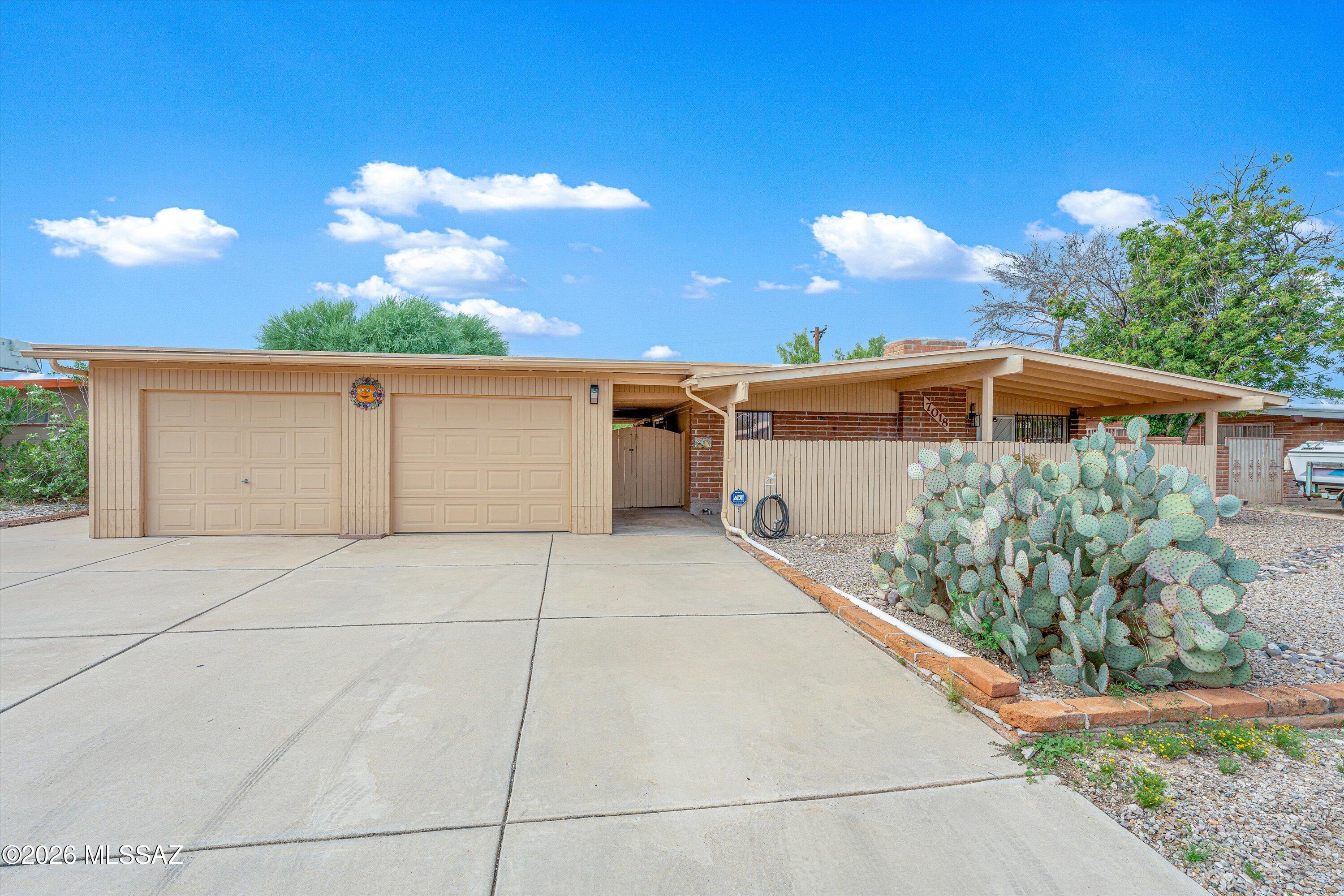 Range priced - seller will consider offers between $300,000 and $325,000. Welcome to this charming 3-bedroom, 2-bath home that offers comfortable living, thoughtful storage, and some truly standout features. This home makes excellent use of its space and is a wonderful option for a first-time buyer, growing family, or anyone looking for a low-maintenance lifestyle. The kitchen offers plenty of storage and functional space, while the home's cozy layout creates an inviting atmosphere that's easy to make your own. Step outside to enjoy the beautiful, low-maintenance backyard and an especially deep, spacious covered patio - perfect for relaxing, entertaining, dining outdoors, or simply enjoying the extra living space year-round.
The real showstopper, however, is the extra-deep two-car garage, which is fully cooled by a mini-split AC unit. Originally used as a workshop, this expansive space offers an abundance of room for vehicles, hobbies, projects, equipment, or additional storage. Ample built-in storage keeps everything organized, while full climate control makes the garage comfortable and usable in every season. With its practical layout, generous storage, and exceptional garage/workshop, this home offers far more than its modest footprint suggests. Come see all the possibilities!