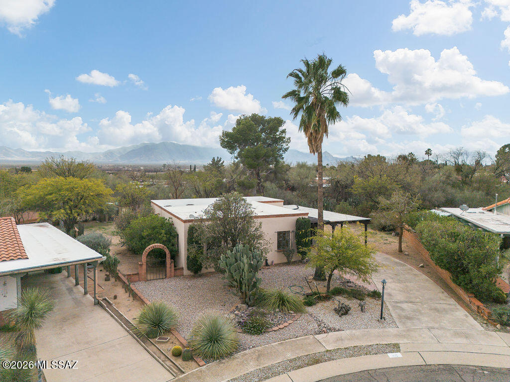 55+ Community of Green Valley Fairways. Bright and lovely with original kitchen and baths, this 3BR/2BA  with separate family room has a cozy rear yard and a covered patio off the living room. Lot has additional yard to extend and make your own paradise.  Conveniently located near shopping, dining, and Golf.