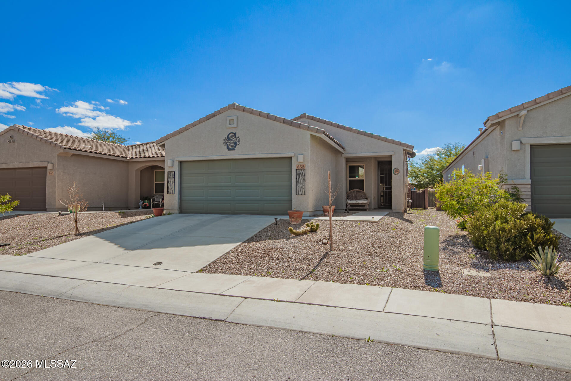 Beautiful nearly new home w/granite countertops, OWNED solar system, all new stainless steel appliances and open floor plan that welcomes you home when you open your door! Your family will love to make memories in the home which features: super low energy bills ($34 low, $79 high from owned solar system), high 9 foot ceilings, covered patio w/total privacy in the backyard, open floor plan, & walk-in full body massage tub. You'll love to entertain in this neighborhood too which features Olympic-sized community pool & large park w/basketball court & playground. Come make this wonderful house your home today!