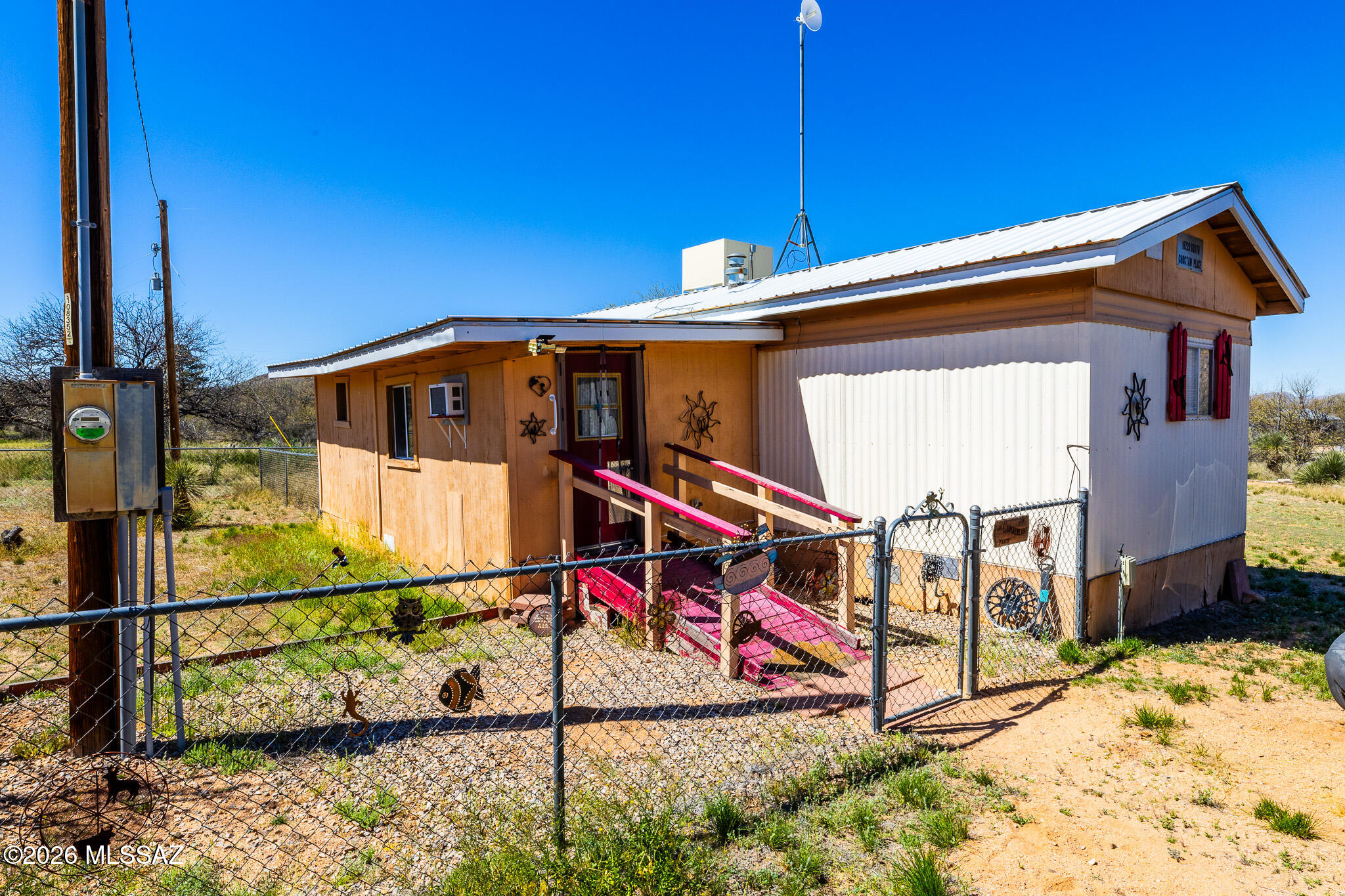 Cozy  2 bedroom, 2 bathroom mobile home with an added bonus space, situated on a spacious 1-acre lot. Located on a quiet cul-de-sac, this property offers beautiful views and plenty of room for animals, outdoor activities, or future improvements. Additional features include a storage shed for added convenience and ample open space to make your own. 48 hours needed for showings due to tenant occupied. Home is being sold ''As-Is'' Addition will need some improvements. Mobile home to be affixed at closing.