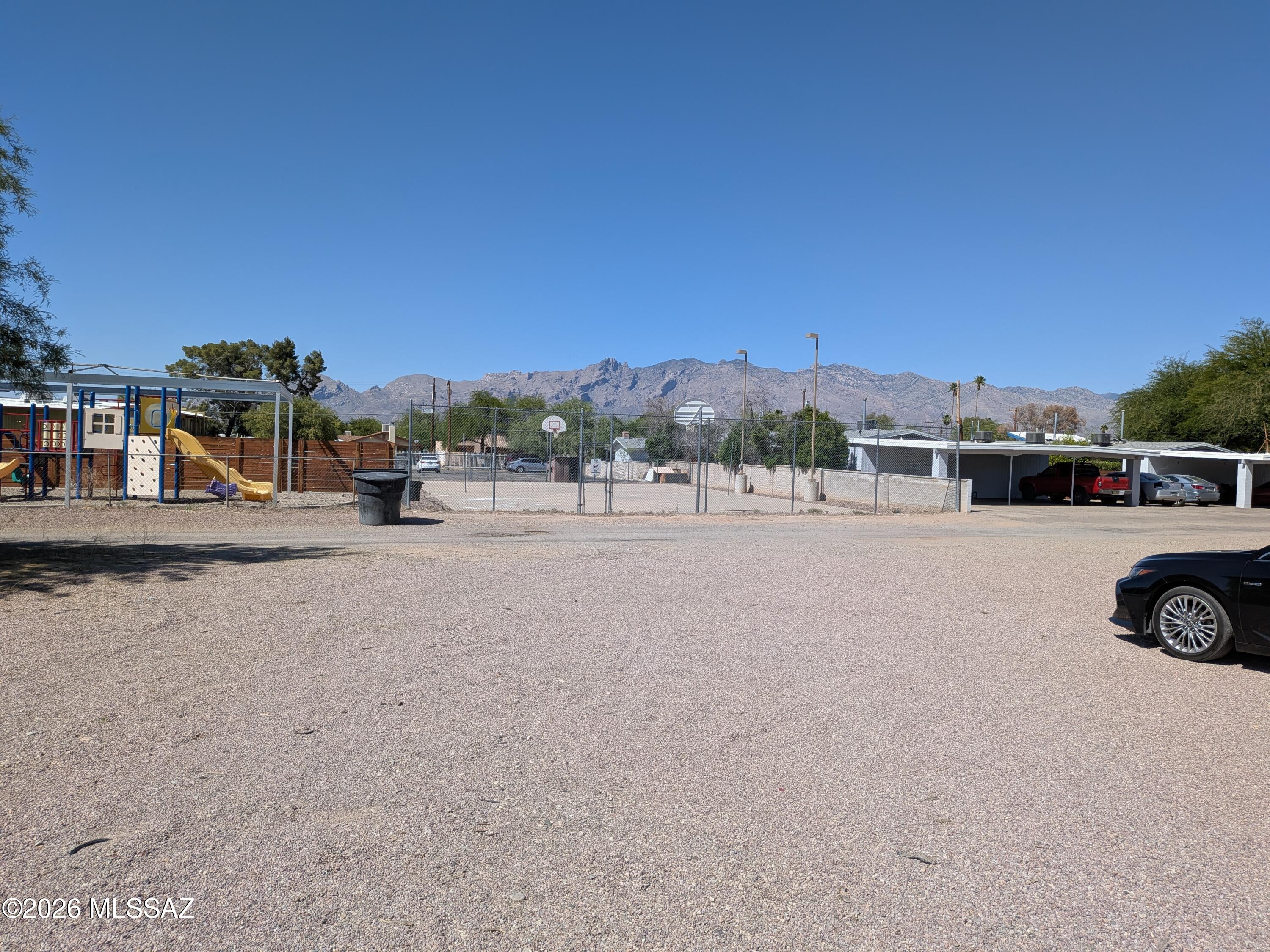 Great Location! 105 X 100 C-1 lot off of Tucson Blvd.  Has 2 water meters and a sewer connection. Build 2 duplexes, 4-plex or separate the lot into two 5000 sq ft lots with a house and a guest house on each lot.  
Walk to bus line, and several great restaurants  Culinary Dropout, Kingfisher, Postino Grant, Slice and Ice, MoJo Cuban Kitchen,
The blind Pig, Eegee's, Snooze. Also close to the U of A and Blenman school.