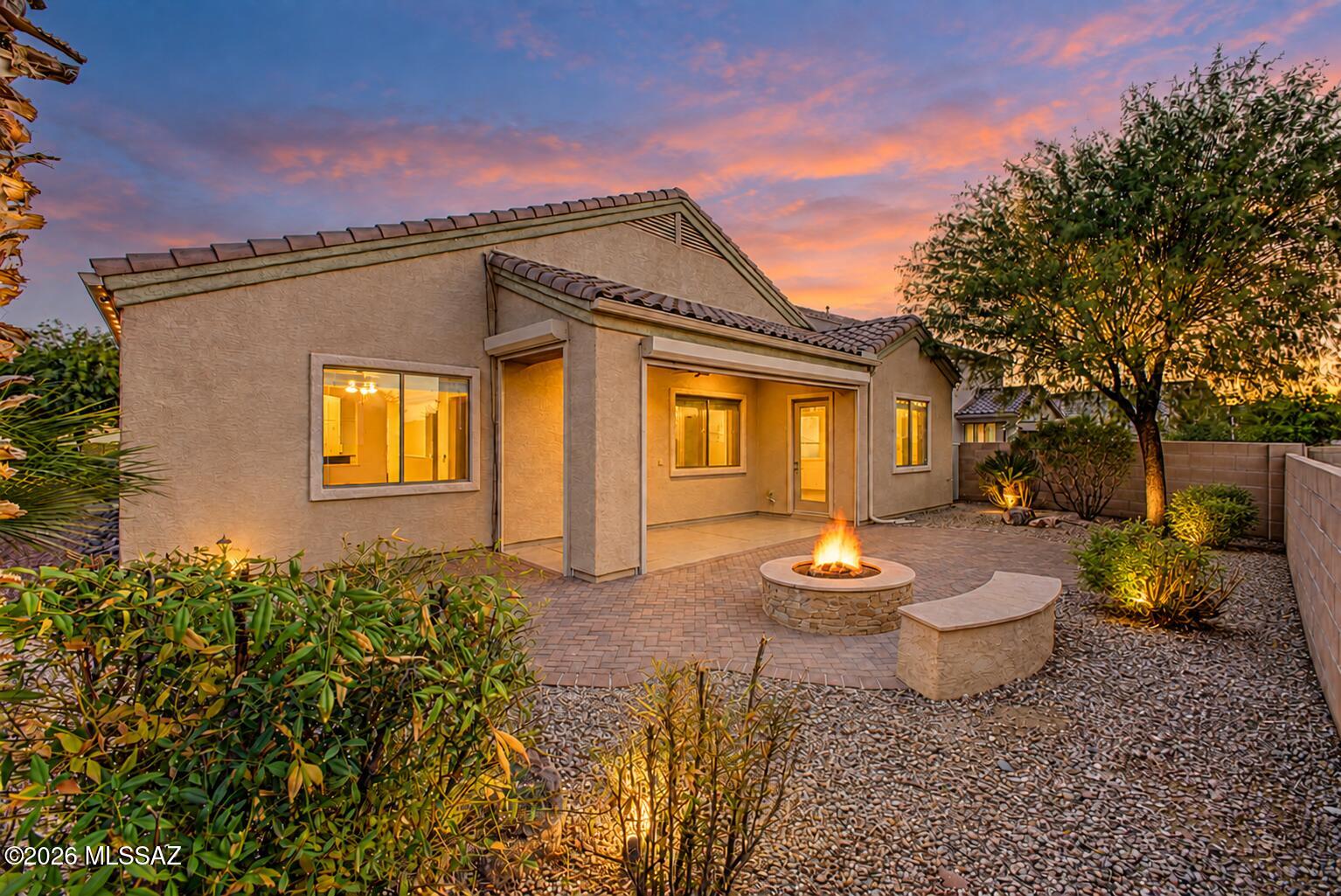 Fall in love with this gorgeous 4-bedroom, 2-bathroom home! Fantastic curb appeal, with a manicured landscape and a 3-car garage! The interior showcases a thoughtfully designed layout ideal for entertaining and easy everyday living, with tile floors, abundant natural light, and a soothing palette that makes every space feel warm and welcoming. The kitchen displays plenty of cabinet space, a tile backsplash, granite countertops, stainless steel appliances, and a two-tiered island. The primary retreat includes a private exit, a full ensuite, and a walk-in closet for effortless organization. Gather with your loved ones in the backyard, complete with a cozy covered patio with roller shutters, a fire pit perfect for entertaining, and a shed for added storage. Make this gem yours now!