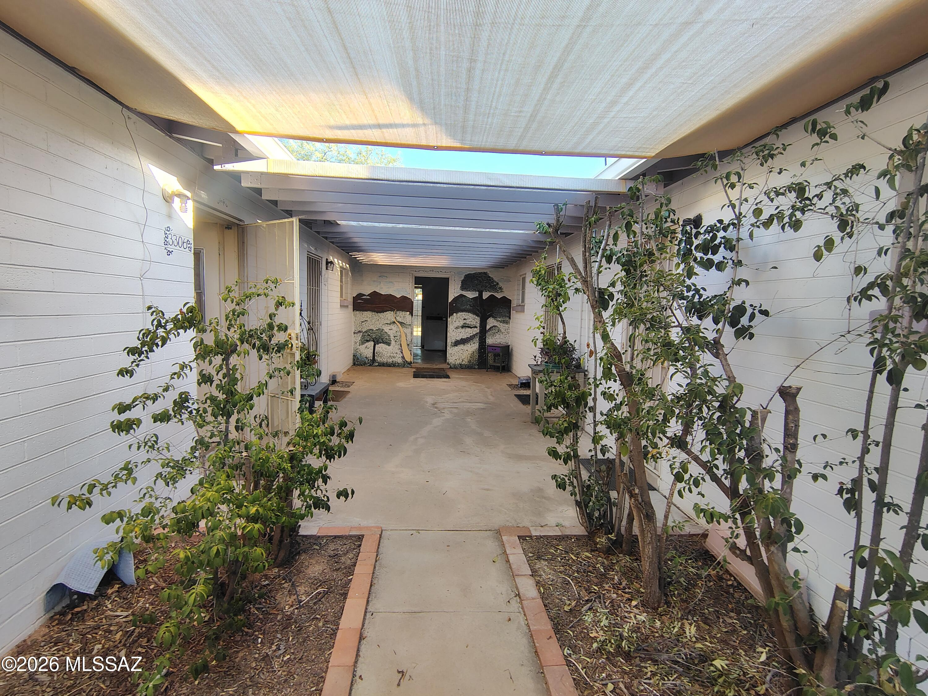 4-Plex or 2 Duplex units in the center of town! Each unit has a great room with dining area, kitchen w/refrig and gas range, spacious bedrooms, central air, and ceiling fans in every room to keep it cool even in summer! Each unit features a private, shaded and secured 600-sq. ft. patio area perfect for relaxing, and on the other side kitchen doors lead to a common area patio (between the 2 duplexes) and access to the common area laundry room with washer and dryer for shared tenant use. Insulated attics, custom gutters. Four storage sheds, storage /laundry room, small wood shed & Rubbermaid tool shed means TONS of storage!  Also includes 4 IBC rainwater harvesting containers & passive groundwater harvesting. *These units and the common grounds are part of a long-term demonstration plan for sustainable rental housing, which includes rainwater harvesting, low-water native and adapted plants, food crops, and native pollinator gardens, plus rewilding the grounds and rebuilding the soil. Fantastic location right in the center of town! Easy access to Banner UMC, I-10, TMC, U of A, Tucson Botanical Gardens, parks, restaurants, shopping, everything!