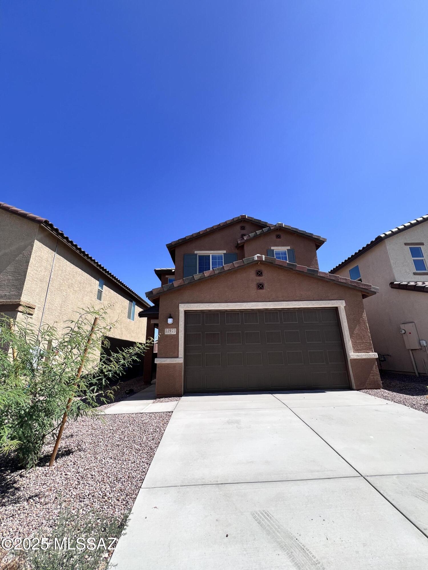 Beautiful 3bdr/2.5ba home in Vail! Open/bright Greatroom w/9ft ceilings, kitchen features Granite counters, stainless steel appliances, gas range, walk-in pantry, and island. Linen closet, coat closet and 1/2 bath downstairs. Spacious primary bedroom w/ensuite offers dual vanity, shower and walk-in closet. Laundry room w/washer and dryer is upstairs. Fenced backyard w/covered patio and mountain views! Tenant occupied until 05/31/2026