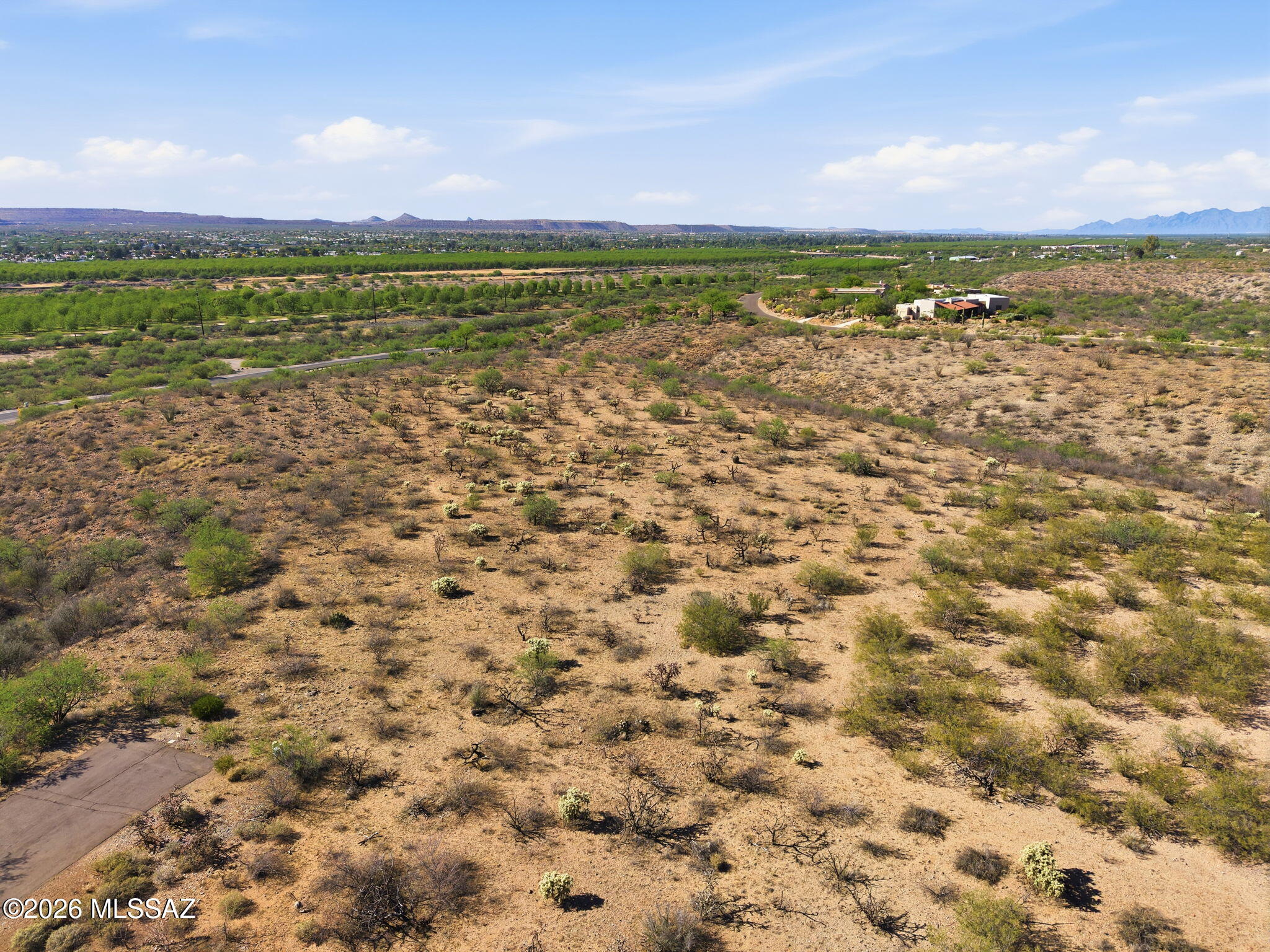 Set within the prestigious gated community of Madera Foothills Estates, Lot 8 offers an exceptional opportunity to create a private desert retreat on a grand scale. Spanning 3.35 acres, this expansive homesite delivers sweeping panoramic views, with the Santa Rita Mountains rising dramatically in the distance--an ever-changing canvas of color and light. With its generous size, this lot gives you the freedom to design without compromise--whether it's a sprawling custom home, extended outdoor living spaces, or simply the luxury of space and privacy all around you. Here, you can position your home to fully capture the breathtaking surroundings while enjoying the peace and quiet that only a property of this size can provide. Utilities are already available at the property, including gas, electric, and water provided by Global Water Resources--no well required--helping streamline the building process. A septic system will need to be installed by the buyer. Optional GVR membership is also available, offering access to a wide range of recreational amenities.

This is more than just a homesite--it's a rare canvas with room to dream bigger. Build your vision, embrace the views, and create something truly extraordinary.