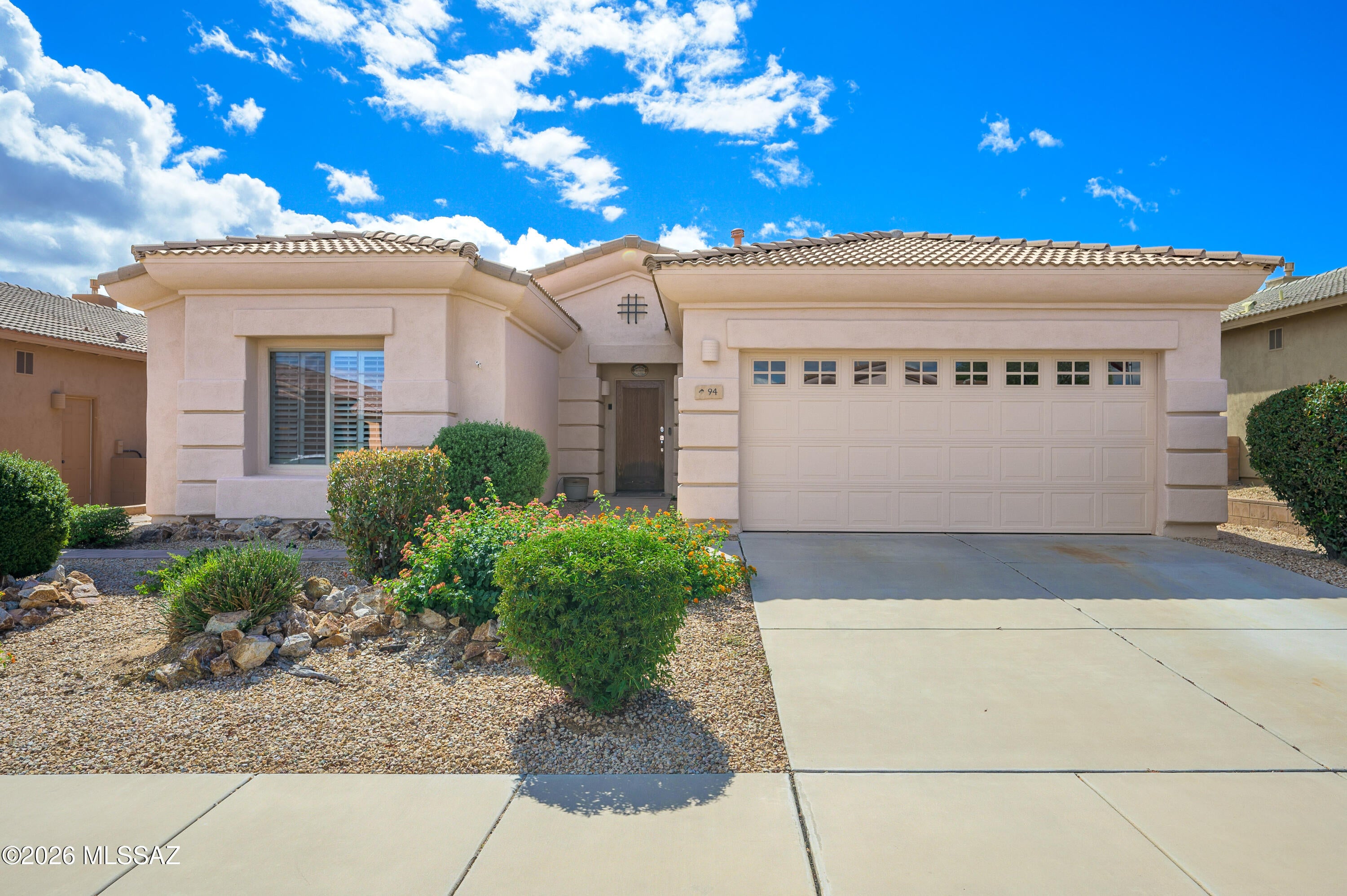 Welcome to La Joya Verde II,  a welcoming age-restricted community in the heart of the Green Valley-Sahuarita area, where resort-style living meets everyday convenience. Residents enjoy a vibrant lifestyle with amenities and activities, including water aerobics, pickleball, and a variety of social events. Separate from Green Valley Recreation (GVR), La Joya Verde offers its own distinctive amenities and inviting opportunities to connect with neighbors. Lovingly maintained by its original owners, this charming three-bedroom, two-full-bath home offers comfort, functionality, and thoughtful updates. The kitchen and Primary Suite features extended Bay windows, kitchen features, stainless steel appliances, the HVAC system was replaced in 2020, and laminate flooring enhances all three bedrooms. The exterior has also been freshly painted, creating a polished first impression. Professionally landscaped front and back yard provides inviting spaces for gardening, entertaining, or enjoying a quiet morning coffee or evening glass of wine. Inside, California Closets offer exceptional organization, while the garage features an epoxy-coated floor and abundant cabinetry for convenient storage Ideally located near the clubhouse and pool, this home provides easy access to community amenities, shopping, restaurants, everyday conveniences, and I-19. Come experience the comfort, convenience, and active lifestyle that make La Joya Vista such a wonderful place to call home. Schedule your private showing today!