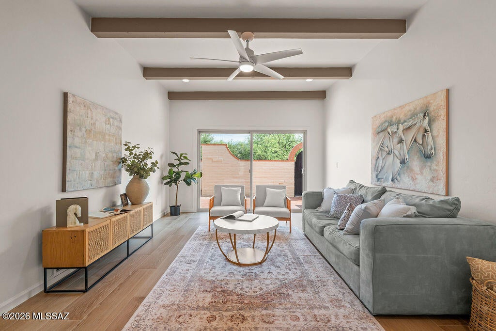 Beautifully remodeled in sought-after Colonia Verde, this light-filled home pairs elevated finishes with exceptional space and functionality. The high-end kitchen features a breakfast bar, charming breakfast nook and two pantries, including a walk-in. Two spacious living areas boast soaring ceilings, while one showcases beautiful beams, a fireplace and mountain views. The generous primary suite offers two closets and a spa-inspired bath with custom glass shower and champagne bronze finishes. Two additional oversized bedrooms, formal dining, abundant storage and a large laundry room add to the thoughtful design. Enjoy a low-care yard with mountain views, 2-car garage, two community pools, fitness center, clubhouse, sauna and walking trails.