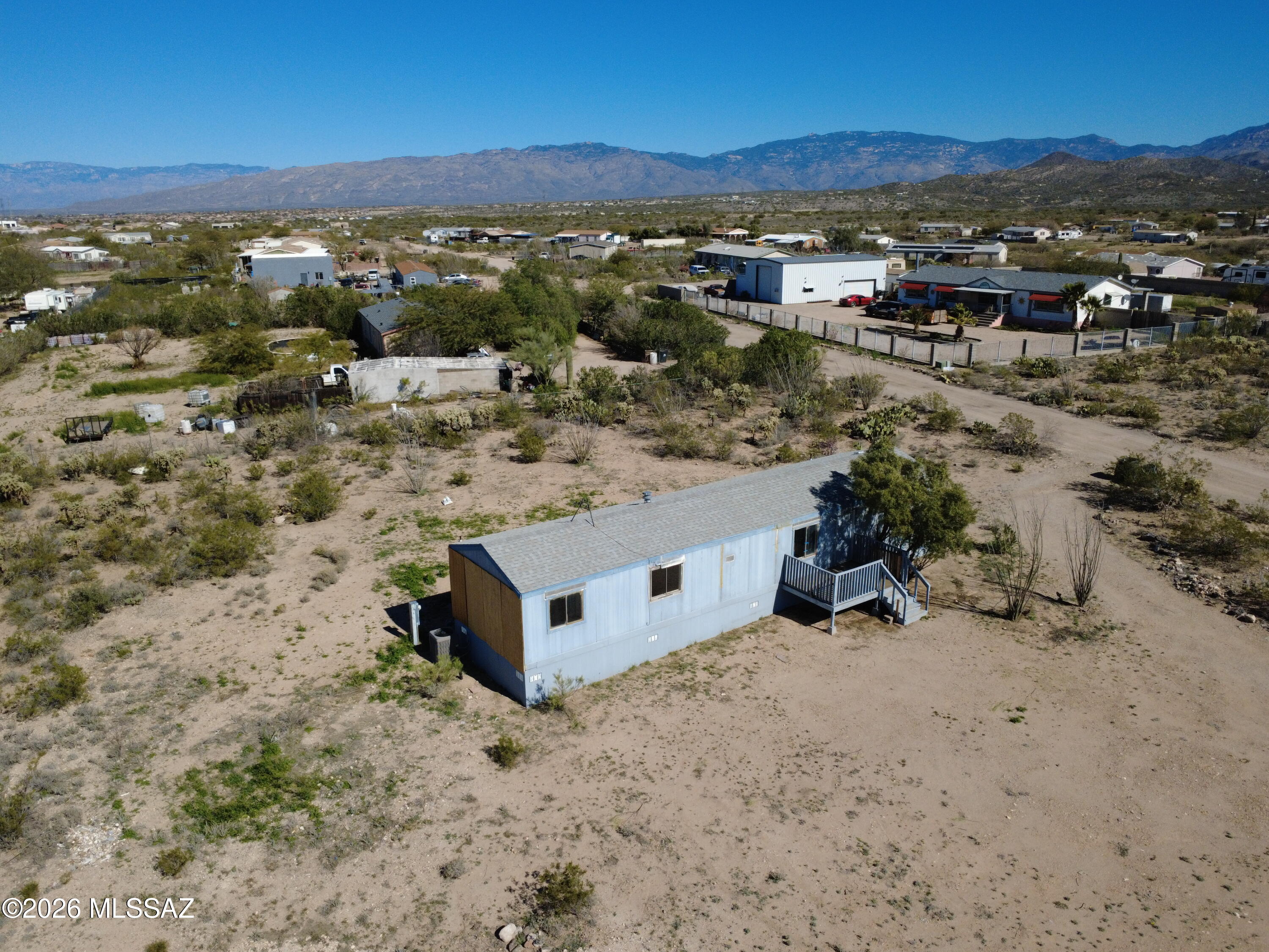 Great opportunity to own a HUD Home and save thousands!  Opportunity awaits! Desert serenity meets wide open space. Situated on a spacious 1-acre lot with breathtaking mountain views, this home offers privacy and room to roam. The open split bedroom floorplan provides ideal separation and effortless flow for everyday living. Relax on the shaded front deck and soak in stunning desert sunsets. A rare blend of space, views, and comfort in sought-after Vail, AZ! Please see attached MLS Addenda for property specific disclosures & repairs. Bidding on a HUD Home is quick & easy! Buyers or agents please call for help with any part of the bidding process.