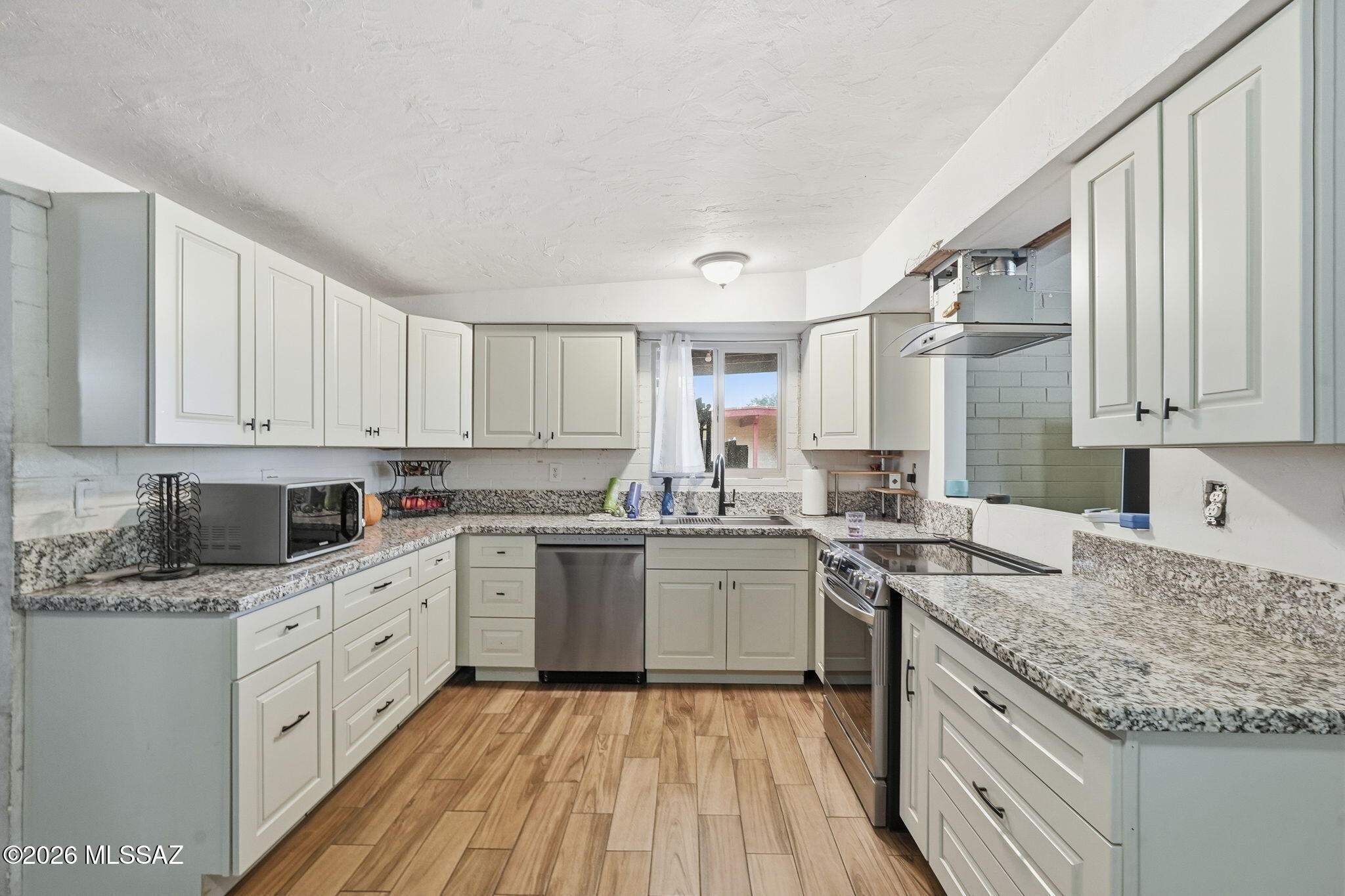 Bring your vision to life. This 3-bedroom, 2-bath east side home is ready for your personal touch, featuring a newer kitchen, newer appliance, 1-car carport and a blank slate backyard ready for your design ideas.  Come see the possibilities.