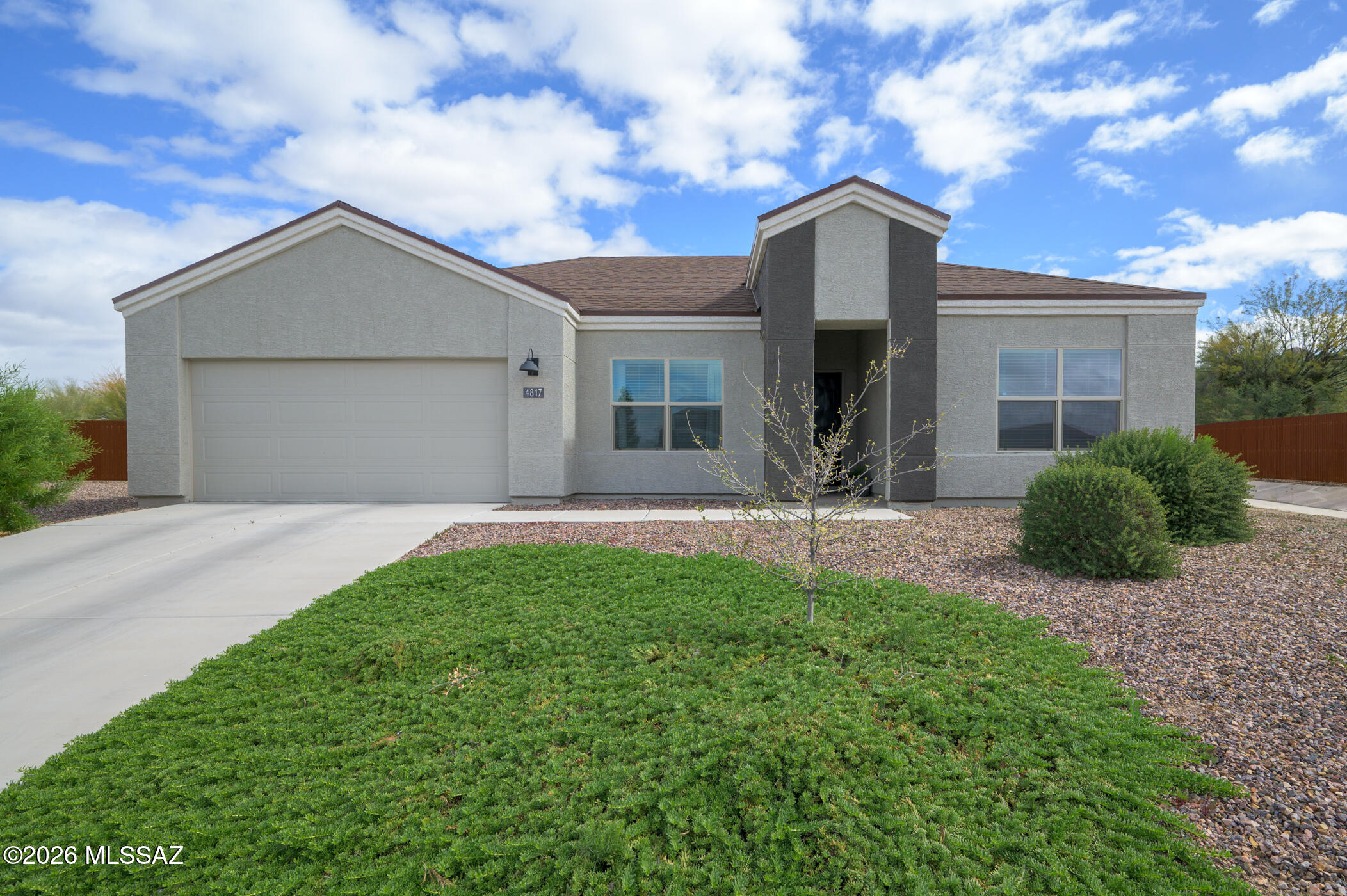 Discover this beautifully crafted 3-bedroom, 2-bathroom home situated at 4817 South Avenida de Raspa in Tucson's desirable southside neighborhood. Built in 2022, this contemporary residence showcases exceptional quality construction throughout its thoughtfully designed 1,377 square feet of living space. The home's strategic location places you in a well-established community with convenient access to local amenities. The neighborhood offers a perfect blend of suburban tranquility while maintaining proximity to shopping, dining, and recreational facilities. Access your private backyard oasis featuring a sparkling swimming pool, ideal for Arizona's year-round outdoor lifestyle. Whether you're hosting summer gatherings or simply unwinding after a long day, the pool area provides the perfect setting for relaxation and entertainment.

The outdoor kitchen elevates your entertaining capabilities, allowing you to prepare meals while enjoying the beautiful Arizona weather. This well-appointed cooking space seamlessly integrates with the pool area, creating an ideal environment for hosting friends and family.

Inside, the home reflects modern construction standards with attention to detail evident in every room. The open floor plan maximizes the available square footage, creating an inviting flow between living spaces. Quality finishes and contemporary fixtures complement the home's recent construction date.

This property represents an excellent opportunity to own a nearly new home in an established Tucson neighborhood, complete with resort-style amenities that enhance the Arizona living experience.