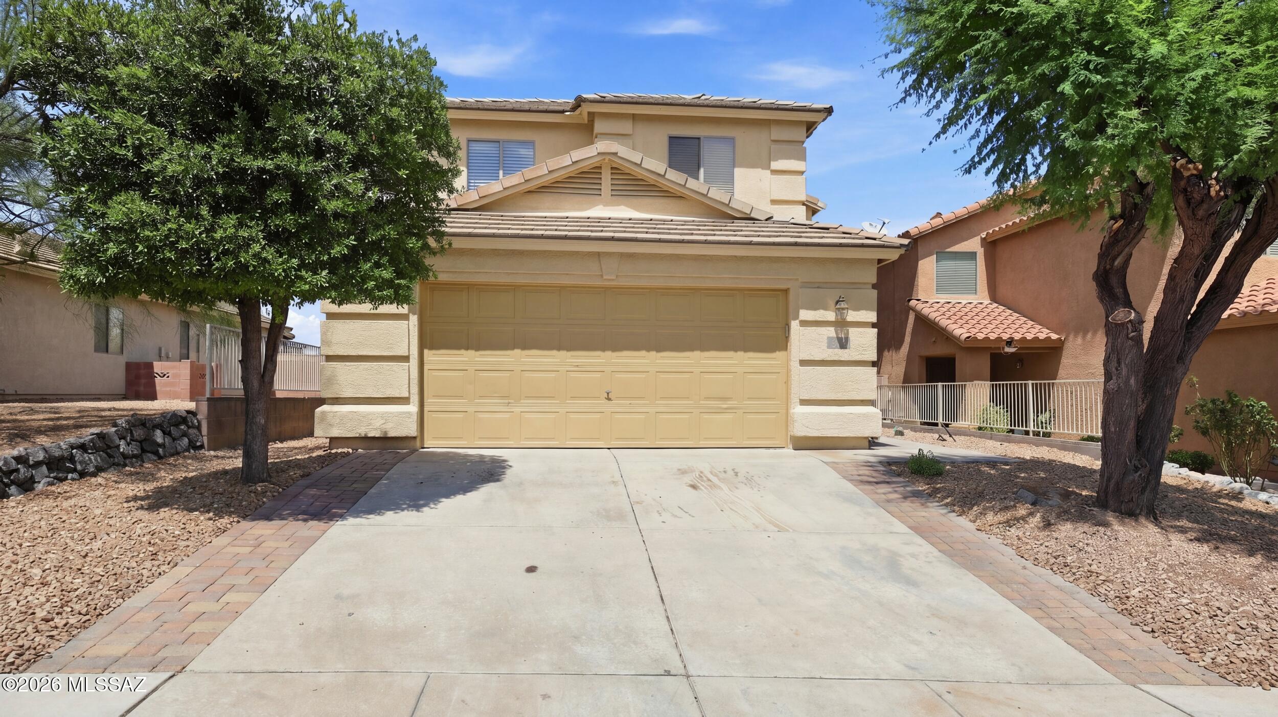 Beautiful two-story home featuring an open floor plan, spacious kitchen, stainless-steel appliances, and plenty of natural light. Enjoy a large backyard with a covered patio, perfect for entertaining or creating your dream outdoor space.