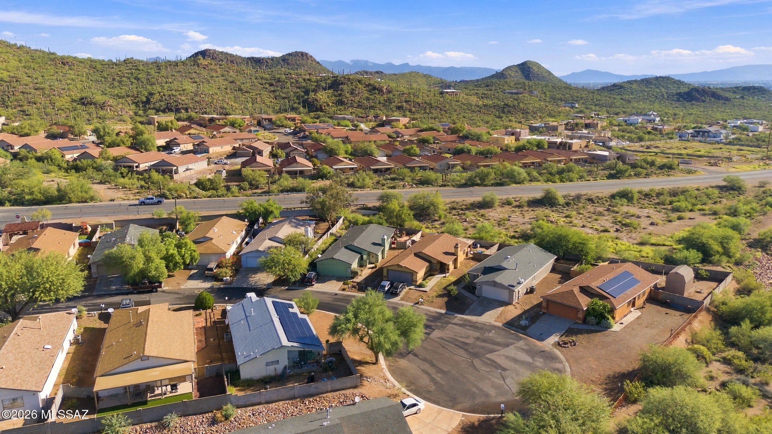 Imagine coming home to beautiful mountain views, colorful Arizona skies, and unforgettable sunsets. Tucked away on a cul-de-sac, this inviting 3-bedroom, 2-bath home offers 1,411 sq. ft. of thoughtfully designed living space, including a spacious primary suite and a versatile den, perfect for a home office, playroom, workout space, or additional living area. The location offers a wonderful balance of scenic desert surroundings and everyday convenience, with shopping, dining, parks, trails, and entertainment just minutes away. Valuable recent improvements include a roof approximately four years old, HVAC approximately three years old, and a water heater and garage door approximately one year old. With flexible living space, beautiful surroundings, and important updates already completed, this home is ready to welcome its next owner!