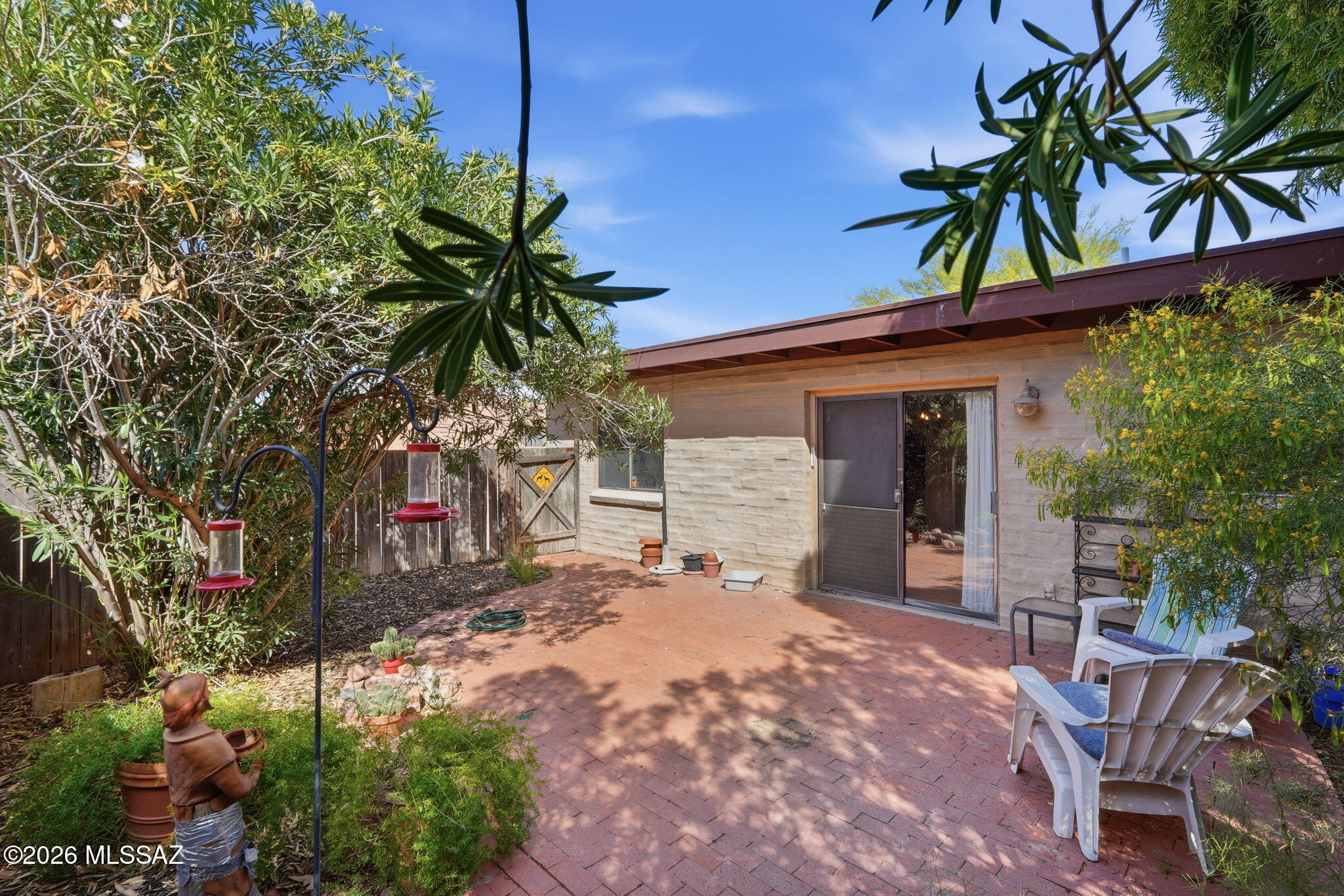 Timeless brick charm with breathtaking mountain, sunrise, and sunset views! This well-maintained 2 bed, 1 bath home is ready for someone to add their personal touch. Built with durable brick construction and located near Campus Farm, it offers classic appeal and modern convenience. Inside, you'll find tile flooring throughout the living areas for easy maintenance, alongside brand new carpet in the bedrooms. Enjoy your breakfast inside at the nook, at the dining area or in your backyard oasis, the choice is yours. A 1-car garage adds convenience and extra storage.
