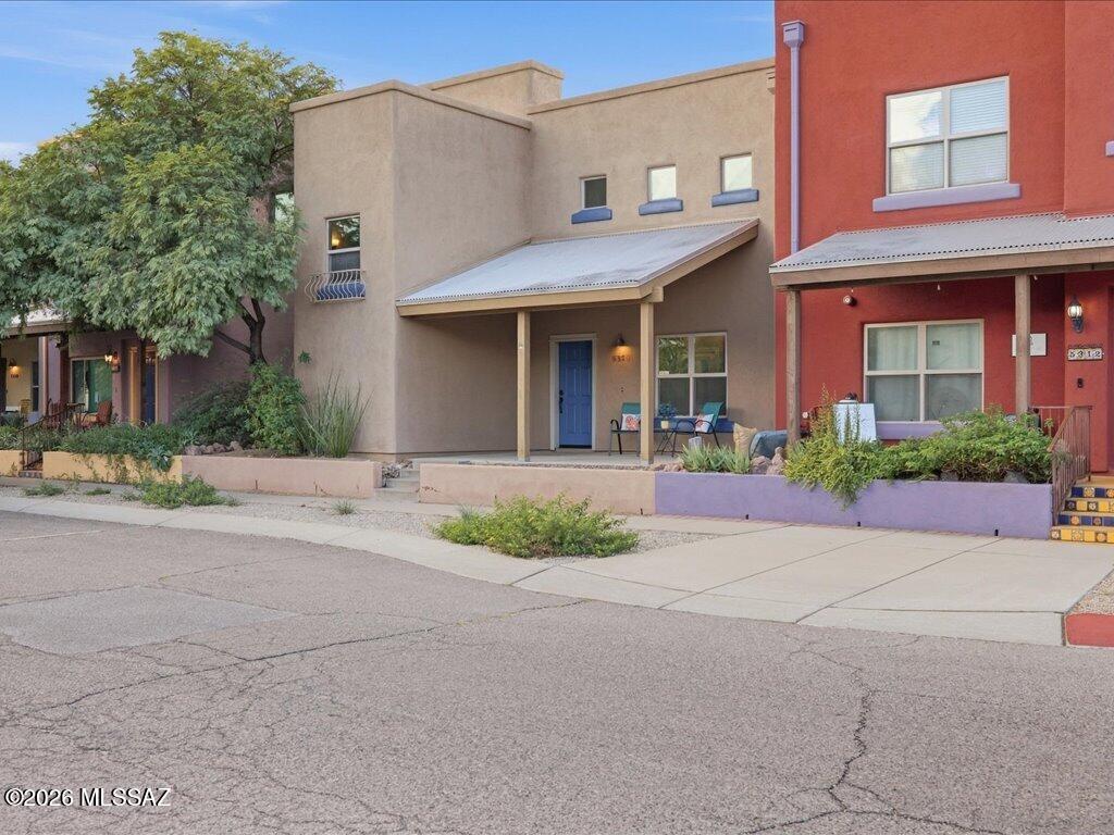 Rare mixed use lot, in the heart of Civano, one of Tucson's most unique and inviting communities, this beautifully upgraded property sits on one of the neighborhood's few mixed-use lots and offers space, style and incredible flexibility. The 3-bedroom, 3-bath main home features soaring ceilings, a spacious kitchen with granite countertops, and upgraded flooring, countertops and showers throughout. A separate 1-bedroom, 1-bath casita with kitchenette and private entrance is perfect for guests, multigenerational living or a private retreat. The conditioned garage has been converted into a studio/bonus room with its own bathroom and could easily be converted back to a garage. Enjoy a low-maintenance backyard with turf and plenty of room to relax and enjoy Arizona living!