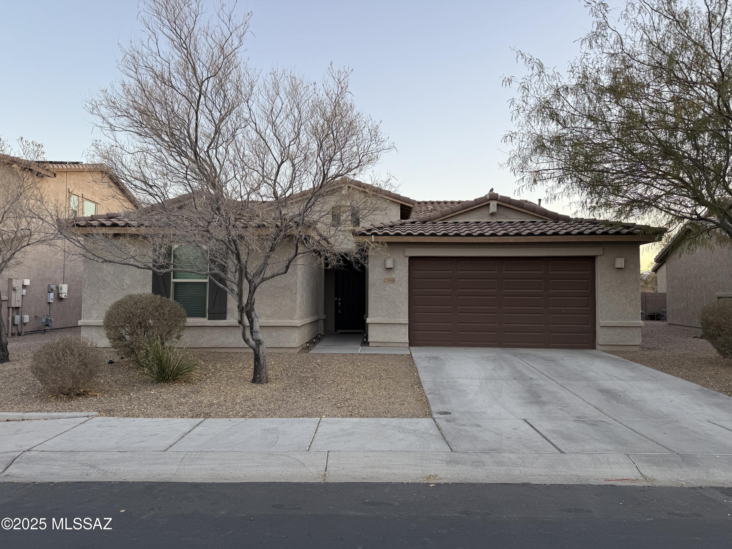 This is the ONE! Great open floorplan with gourmet kitchen, large kitchen island, tile everywhere but bedrooms and the open den which feature carpet. Spacious owners suite with  walk in closet and attached bathroom with dual vanities and large shower. Low care landscaped backyard with covered patio. Great home in a great community! The Frys is now open in the neighborhood as well!! Tenant occupied until 06/30/2026