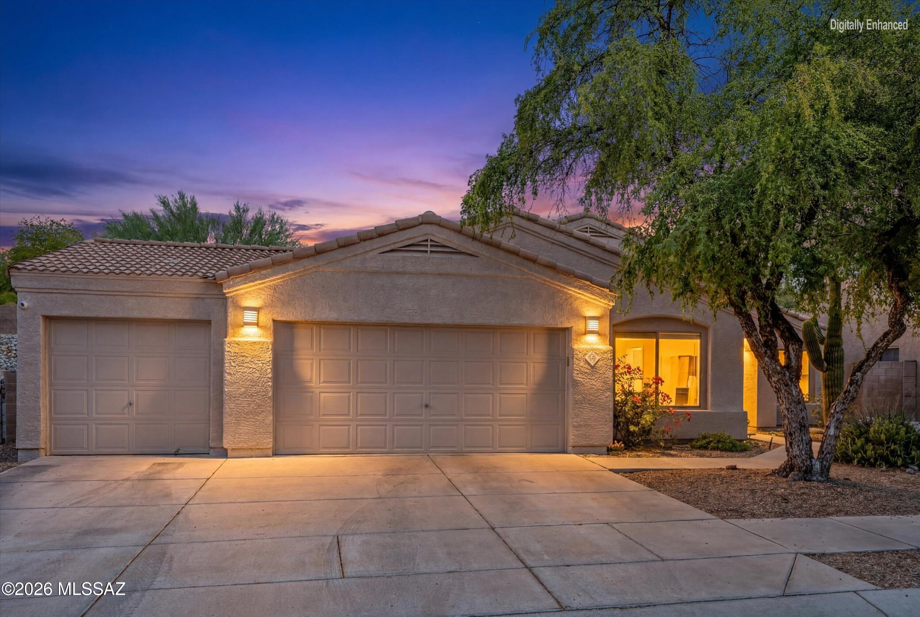 Welcome to this beautifully updated home in the highly sought after Monterra Ridge community of Oro Valley. Built in 2001 and offering 1,634 square feet of thoughtfully designed living space, this charming residence features three bedrooms, two bathrooms and a versatile flex room ideal for a home office, hobby room, play space, fitness room or den. Situated on a generous .18 acre lot, the property is a gardener's delight with multiple garden areas, mature landscaping, and a variety of fruit trees that create a peaceful backyard retreat. Inside, you'll find tasteful updates and an inviting floor plan designed for comfortable everyday living and entertaining. Stunning mountain views from the flex room and two of the bedrooms, providing a picturesque backdrop and abundant natural light. Whether relaxing indoors, tending to the gardens, or enjoying Arizona's beautiful weather on the back patio, this home offers a unique blend of comfort, beauty and functionality. Located in one of Oro Valley's most desirable and well established communities, close to parks, shopping, dining, golf, hiking, biking, and more, this move-in ready home is an exceptional opportunity to experience the best of Southern Arizona living.