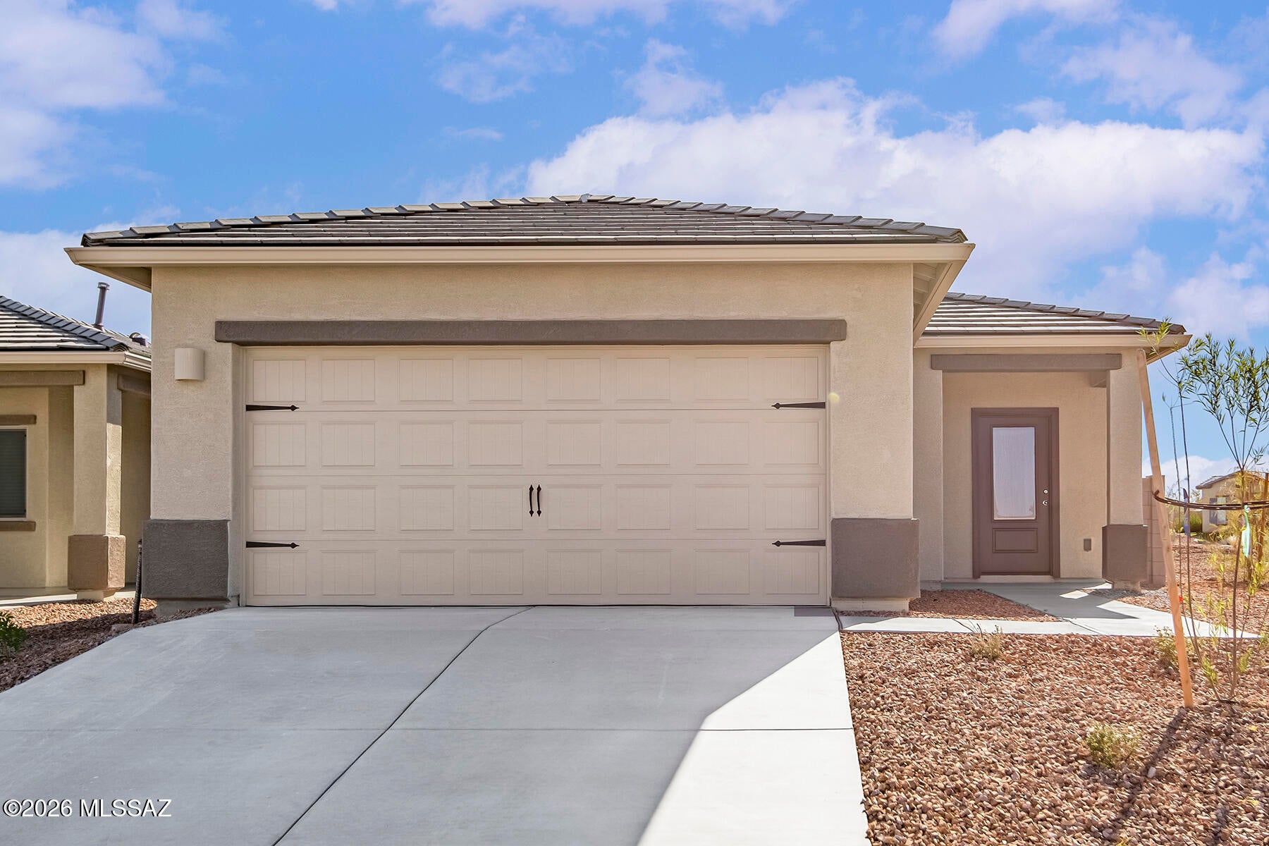 This charming 3-bedroom, 2-bathroom home defines modern comfort. This cozy residence features a spacious great room, breakfast area, private master suite, & a 2-car garage. Included upgrades enhance your living experience, with energy-efficient appliances, quartz countertops, wood cabinets & more. Three bedrooms ensure everyone has their own room to spread out, with flexibility to use an extra bedroom as a guest space or home office.
Indulge in the luxury of a private master suite. The bedroom easily accommodates king-size furniture & the walk-in closet & private bathroom provide the ultimate convenience. This home's curb appeal is a visual delight with a professionally landscaped front yard with no backyard neighbors.
