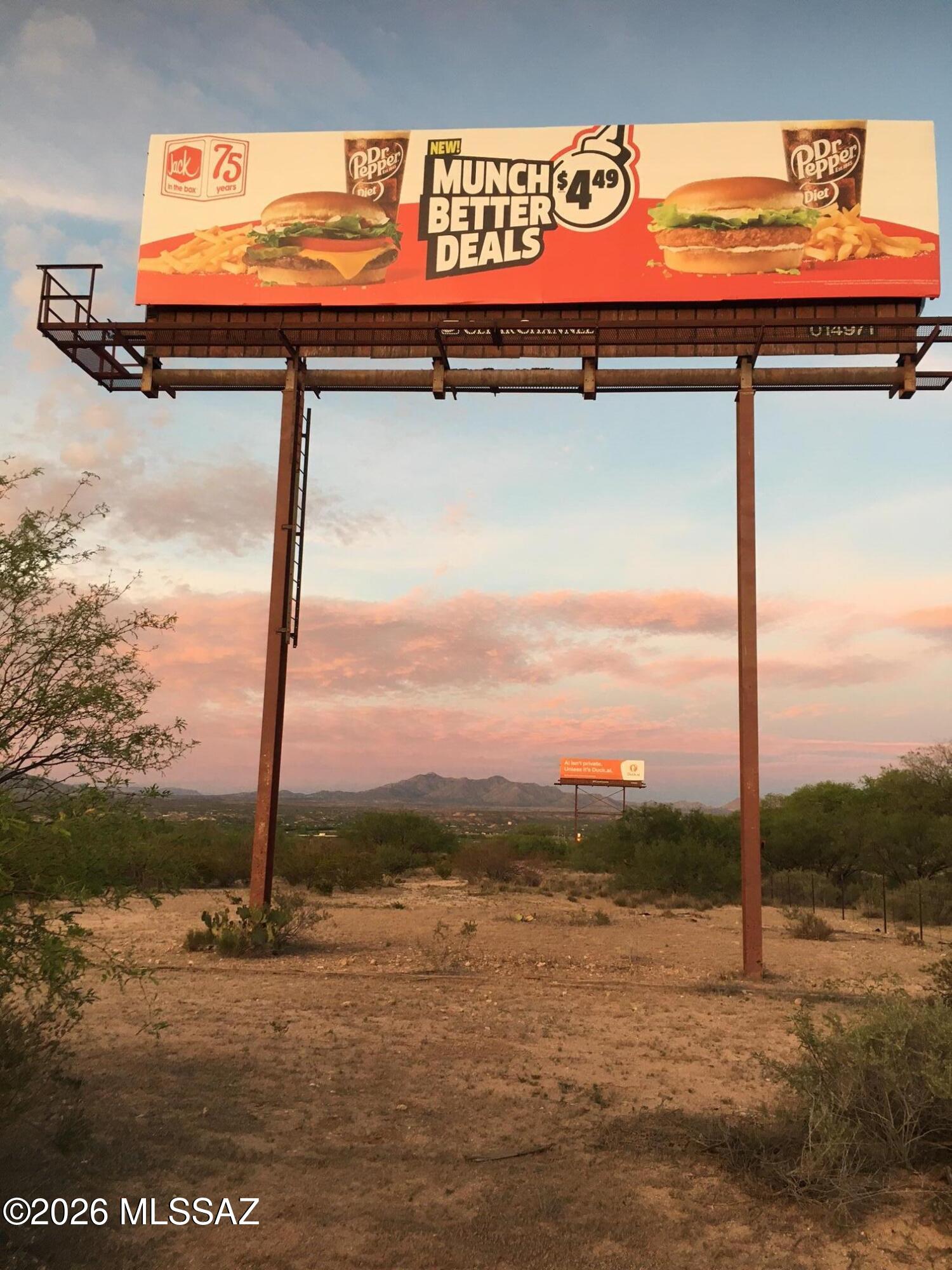 3 commercial acres with 10 year LEASE for two BILLBOARDS - lease runs with 25% of Gross Income on advertising revenue - no maintenance required - just sit back and watch the checks roll in- Income varies based on billboard revenue - averages are at $2255/year.