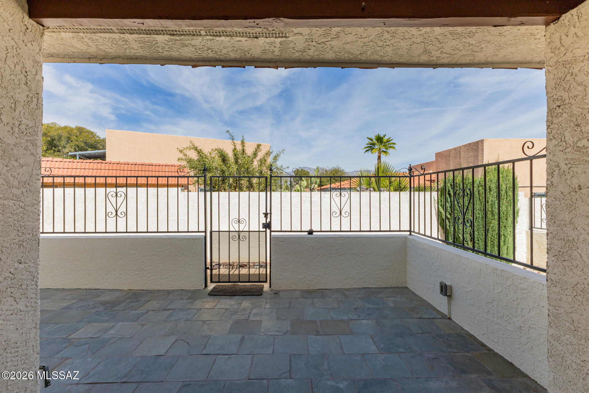 Location! Location! Location! This lovely two bedroom, two bathroom townhome with 943 square feet features unique mountain views of the Catalina mountains from both the large, shaded front patio and the inside living areas! Located on Sahuara north of Grant, it boasts easy access to the Huckleberry Loop Bicycle Trail, numerous restaurants, and shopping nearby. The spacious primary bedroom has its own ensuite, walk-in closet and private patio (including a storage shed) with gated access. All on a single story with interior laundry and includes one covered parking space- this townhome has lots to offer! Call Dane for a private showing, this gem won't last!