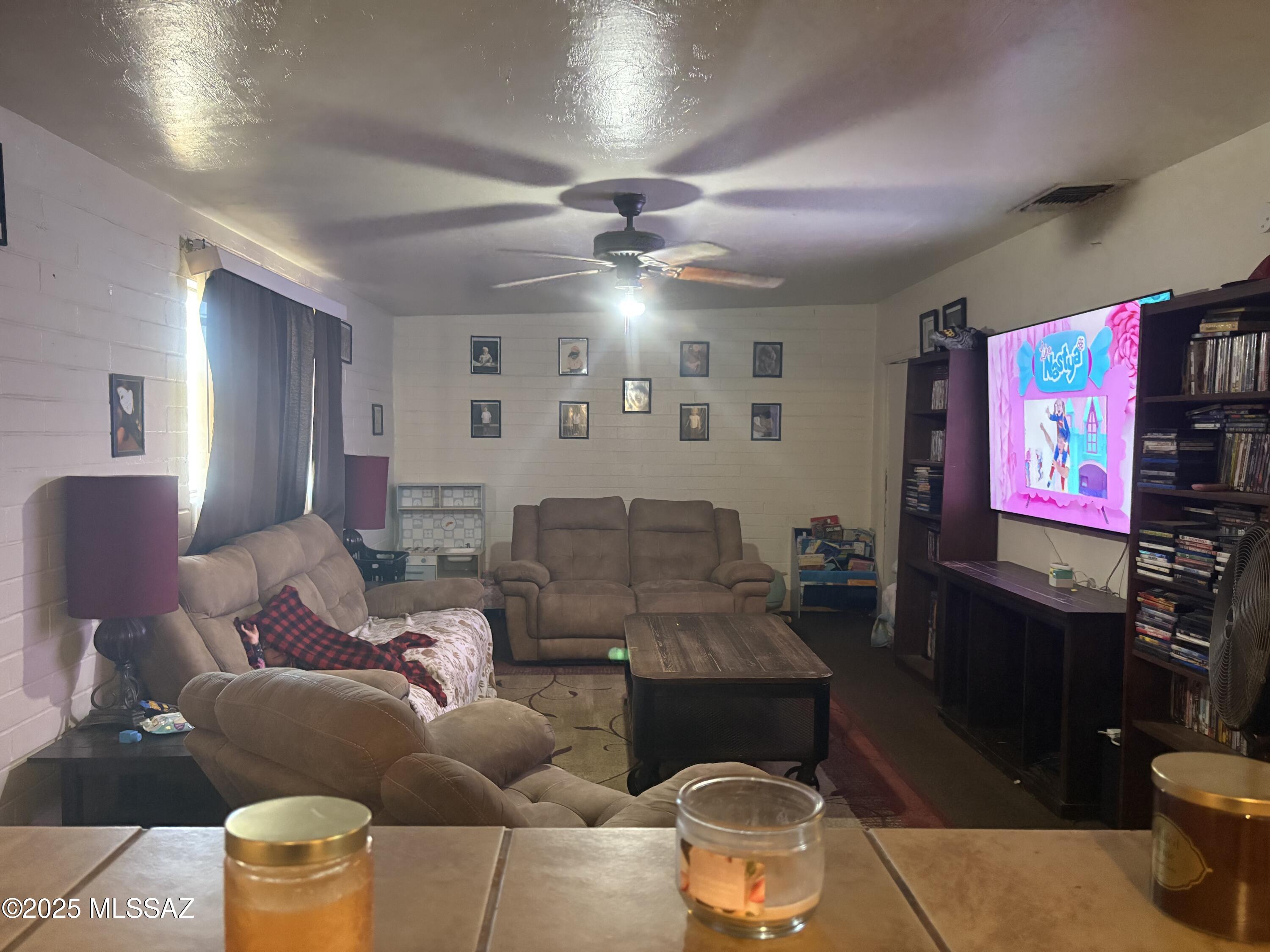QUIET ALWAYS RENTED CENTRALLY LOCATED SFR INCOME PROPERTY WITH RENT UPSIDE (CURRENTLY <$1/SF).  NEAR TUCSON MALL AND AUTO MALL WITH DIRECT ACCESS TO ALL AREAS VIA I-10.  SOLID SLUMP BLOCK, CENTRAL AIR, PRIVATE FENCED YARD, LARGE DINING ROOM, CEDAR CLOSET,  NEWER GAS PACK AND HEAT PUMP UNDER TRANSFERABLE WARRANTY. 

SMALLER 2 BEDROOMS CAN BE USED AS OFFICE, DEN, CRAFT ROOM.  CONVERSION TO DUPLEX POSSIBLE.

NOTE: THIS PROPERTY COULD BE MADE SUBJECT TO A CHANGE OF USE TO COMMERCIAL DUE TO IT'S MU ZONING DESIGNATION.