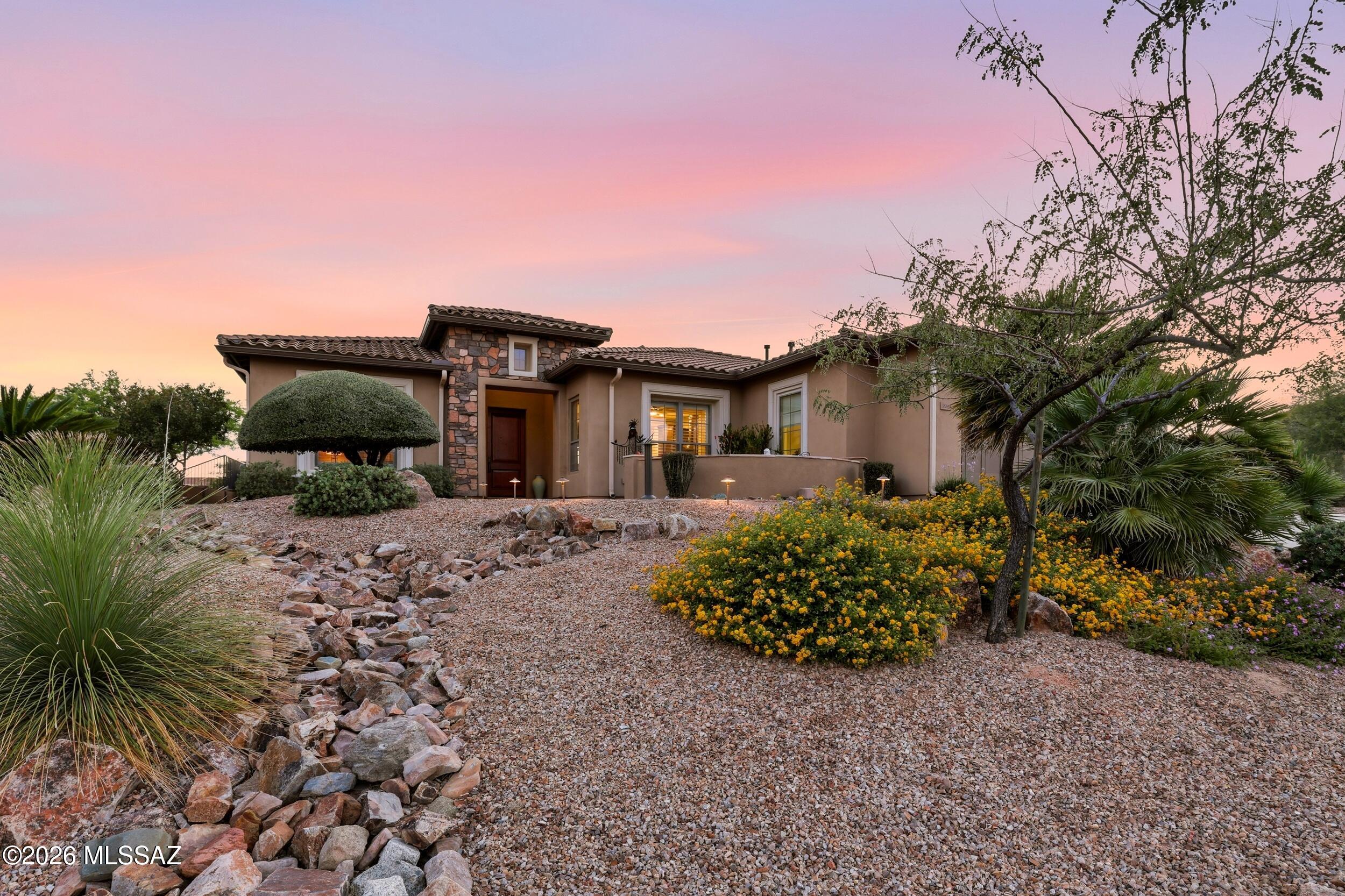 Located in SaddleBrooke Preserve, this updated Sabino model sits on a secluded lot with Catalina Mountain views and a split-bedroom floorplan, each bedroom with an ensuite for added privacy. The open-concept layout includes a spacious den, updated powder room, and a great room designed for comfortable everyday living and entertaining. Major updates include a new roof, gutters, and two Lennox HVAC units installed in 2024.

The remodeled kitchen features refaced and rebuilt cabinetry, Cambria quartz countertops, stainless steel appliances, a large island, and generous dining space. A well-positioned laundry room offers extra storage just off the 3-car garage.

Outdoor living includes a front courtyard, covered extended back patio. Low-maintenance landscaping and mature shade trees create a peaceful outdoor setting. The side yard offers additional potential for a pool or casita.

Saddlebrooke is a premier active adult community with resort-style amenities including golf courses, pools, fitness centers, tennis and pickleball courts, clubhouses, dining, and a wide range of social activities.