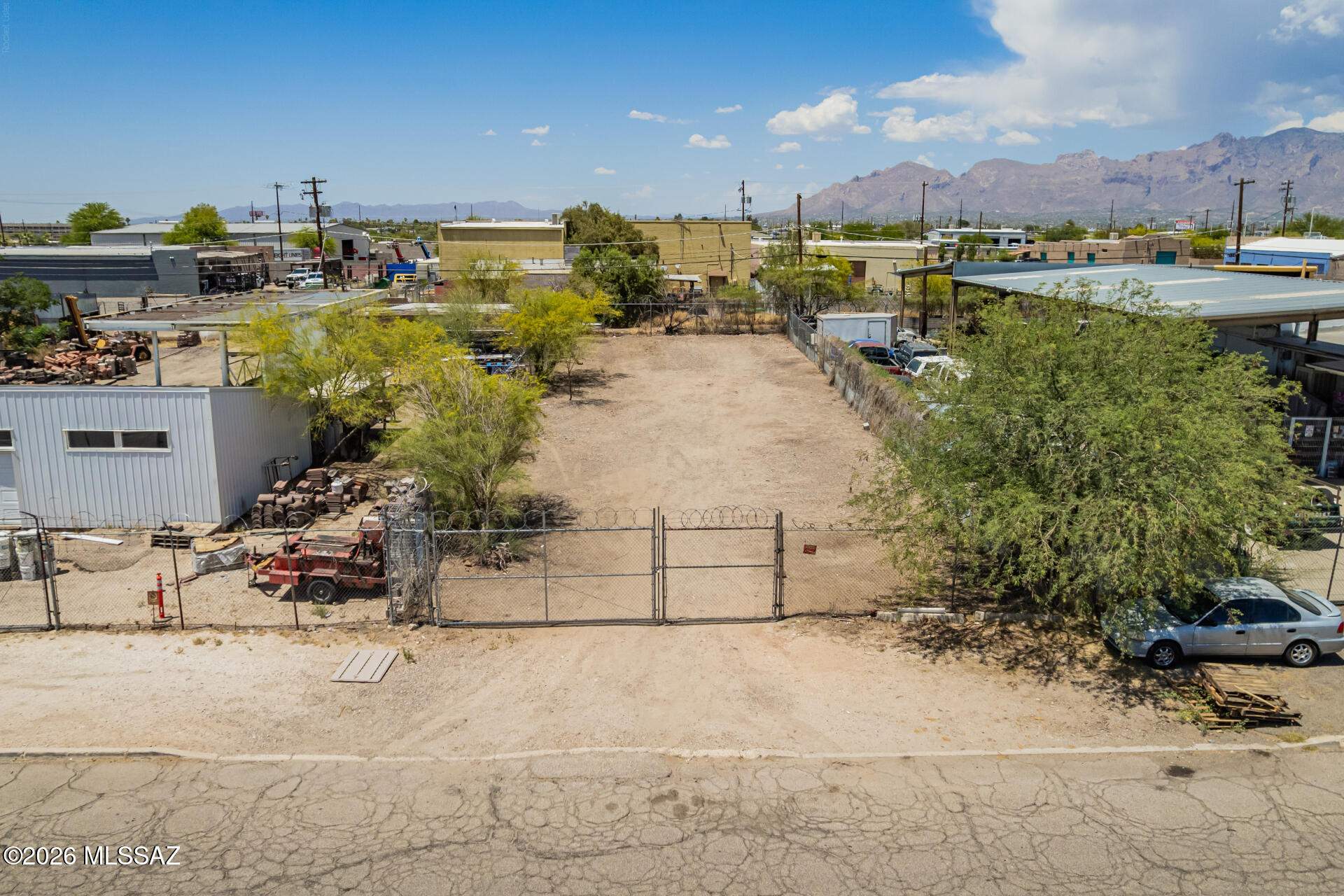 Great opportunity to own a versatile .17-acre industrial lot measuring approximately 50' x 154' deep, offering the ideal setup for a variety of business uses. This gated property provides ample space to add a building, warehouse, workshop, office, or storage structure while still allowing room for work vehicles, trailers, equipment, or fleet parking.
With electric and water available, this lot is ready for your business vision. Whether you're a contractor, service-based business, small industrial user, or investor looking for a functional space with flexibility, this property offers endless potential. Secure, accessible, and ready for development--don't miss this opportunity to own an industrial lot designed to support your business growth.