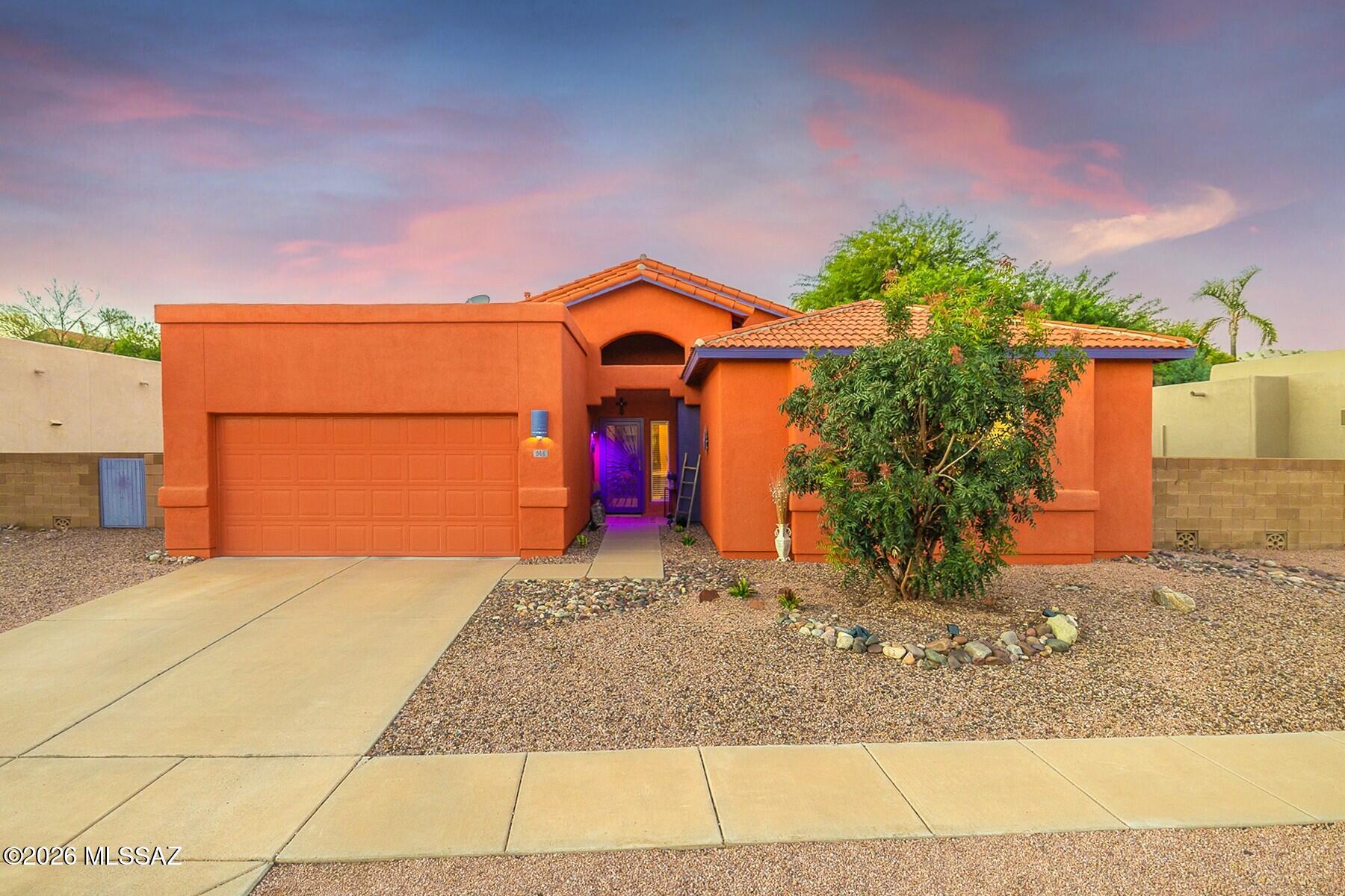 Enjoy comfortable living in this move-in ready AF Sterling-built 2,035 sf split floorplan home featuring 4BD/2BA and 2-car garage. The spacious great room overlooks the backyard, creating a welcoming space to relax or entertain. The kitchen offers a breakfast bar and opens to a large dining area, perfect for everyday meals and gatherings. Additional features include a pool-sized backyard with plenty of possibilities, and newer exterior paint. Recent updates include a 5-year-old HVAC system, tankless water heater and garage door opener, and 2-year old dishwasher and GE One & Done washer/dryer combo. Located in a sought-after Oro Valley neighborhood, this home is conveniently close to shopping, schools, restaurants, medical facilities, parks and trails.