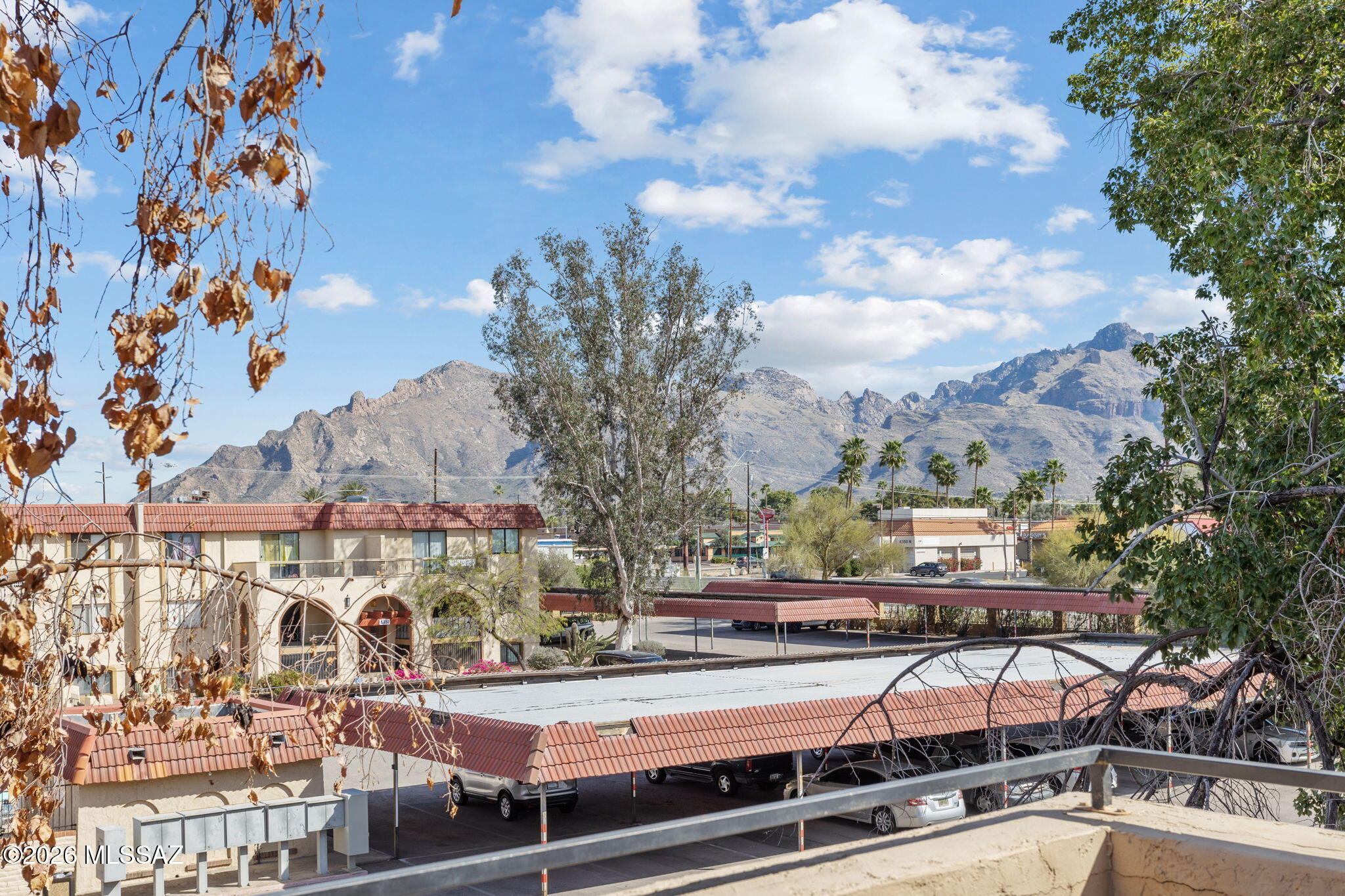 Take a look at this remodeled 1-bed 1-bath condo centrally located close to shopping, restaurants, entertainment, bus lines, U of A, and downtown. Enjoy your morning coffee on the private balcony overlooking one of two community pools and panoramic Catalina Mt views. Stay cool with ceiling fans and AC. All appliances convey, and the home is exceptionally clean, bright, and move-in ready! HOA dues cover gas, water, trash, laundry room, pest control, groundskeeping, exterior and common area maintenance, and the roof, making home ownership easy and care-free. WELCOME TO YOUR NEW HOME!!!