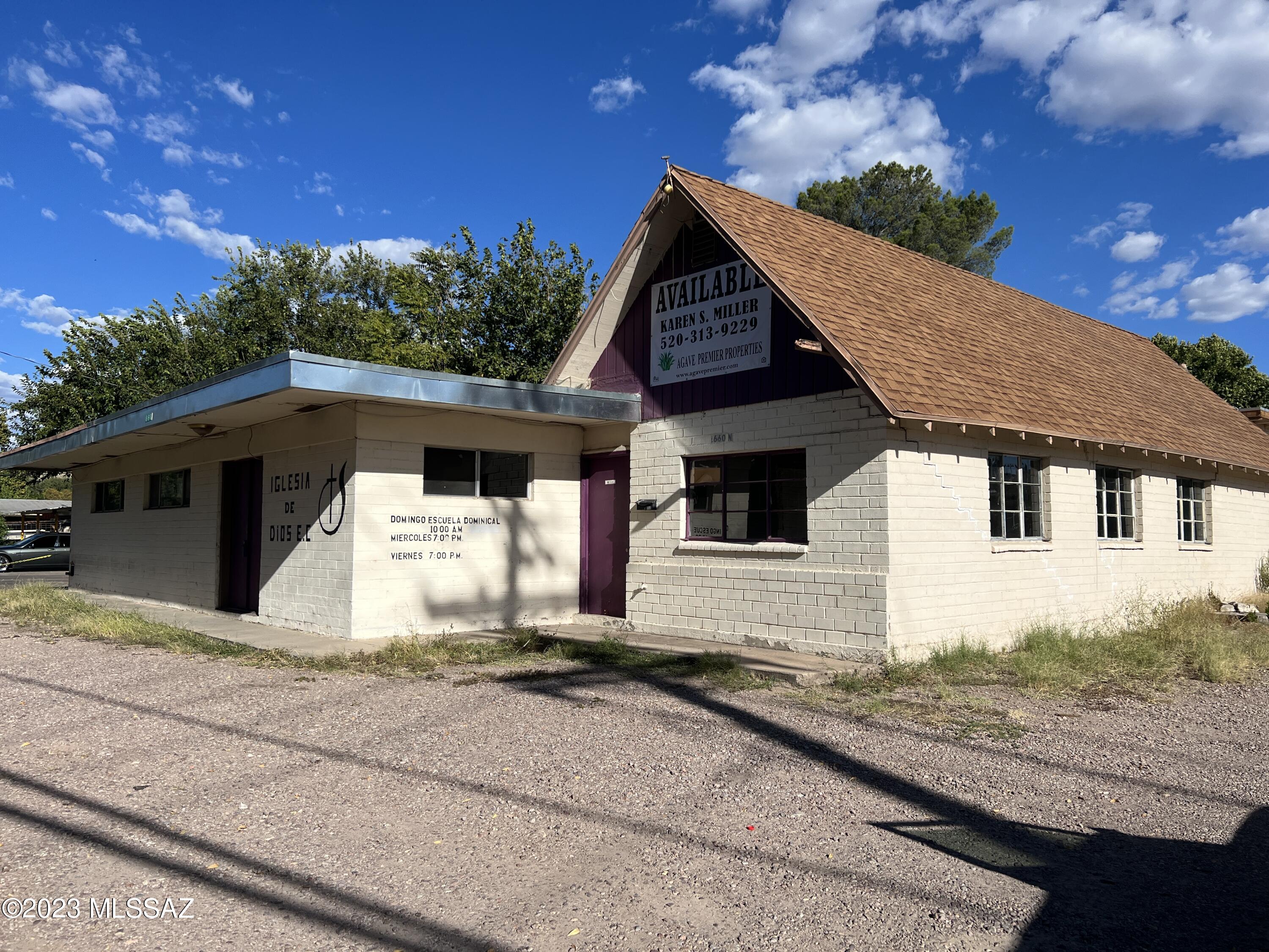This building is located on North Morley Avenue among other small business' that service the community.  This building was previously a church and can be remodeled to be a number of fifferent uses such as school, office, medical facility, day care or shop to name a few. The interior walls and ceilings have been removed down to the studs. This should assist in building out your new location! Call agent for more information.