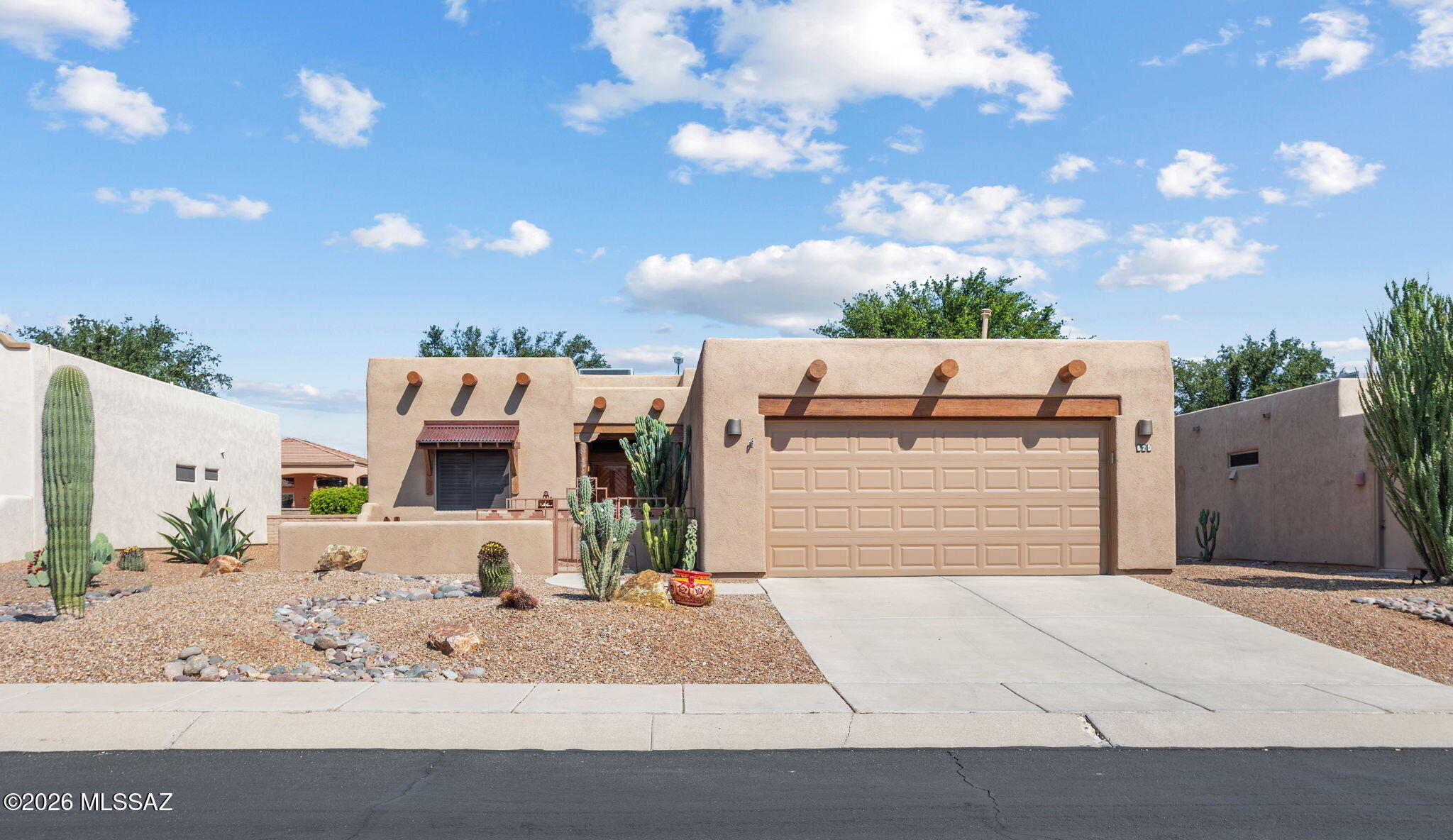 Welcome to this beautifully expanded Silverado model, thoughtfully designed to offer 1,678sqft. of comfortable living with an inviting Southwestern flair. The floorplan provides a spacious den and a convenient interior laundry room, adding both flexibility and functionality to the home. The open-concept living space creates an easy flow for everyday living and entertaining, while plantation shutters and a charming gas beehive fireplace add character and warmth. Step outside and enjoy the peaceful setting overlooking the lush greenbelt, or relax on the patio while taking in beautiful mountain views. Located in a welcoming Green Valley community, residents can enjoy the community pool and spa, while Torres Blancas Golf Course is conveniently located across the street.