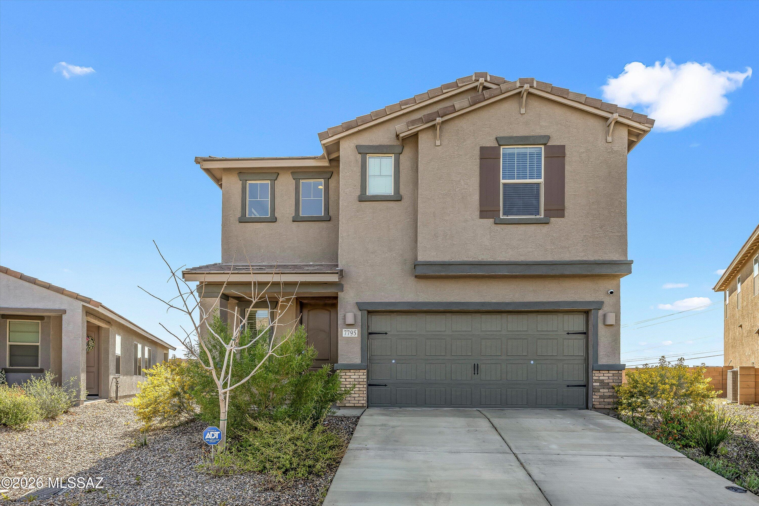 Nearly new and move-in ready! Built in May 2024, this spacious two-story home offers 4 bedrooms, 2.5 baths, and 2,384 sq ft of thoughtfully designed living space. Downstairs features an open-concept kitchen and great room perfect for entertaining, while the covered back patio provides a relaxing outdoor retreat. Built in 2024 means AC, appliances and roof are practically new!  The interior was repainted in March of 2026.. Large corner lot ready for a pool! Designed for efficiency and comfort, the home includes spray foam insulation and a multi-speed HVAC system. Located in a desirable master-planned community with easy access to I-10 and award-winning Vail School District schools.