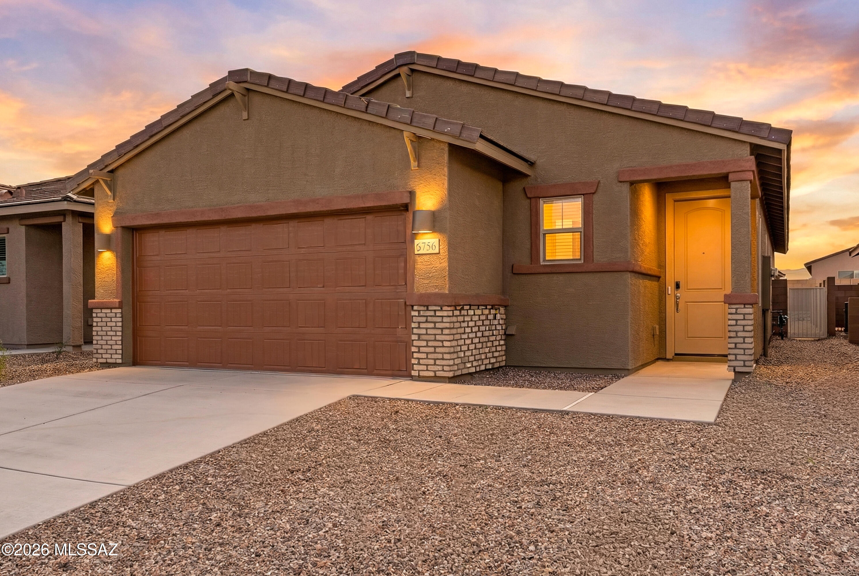 Welcome home, this beauty is the Garden Floorplan, a thoughtfully designed single-story residence offering 3 bedrooms, 2 bathrooms, and a 2-car garage ideal for comfortable, everyday living. Enjoy peaceful mornings or relaxing evenings on the covered back patio, perfect for soaking in Tucson's serene desert setting.

This move-in-ready home includes a washer, dryer, refrigerator, and whole-home blinds, making settling in effortless. Located within La Estancia Homestead, a desirable master-planned community, this is your final opportunity to own in a neighborhood featuring multiple well-designed floorplans and convenient access to Vail School District.

Built with innovative energy-efficient features, this home offers lower utility costs, enhanced comfort, and lasting peace of mind all in a location that blends community living with everyday convenience.