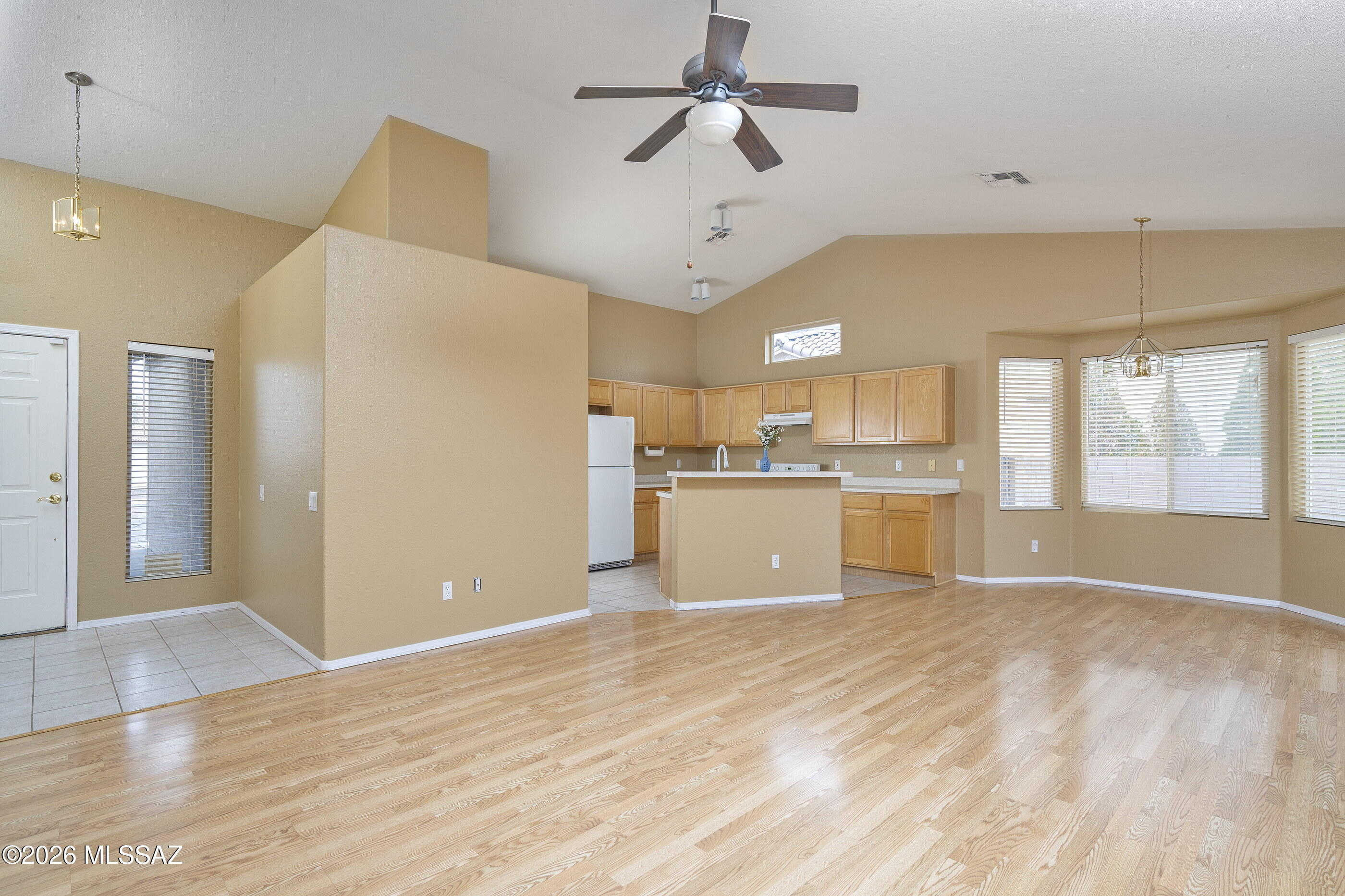 Seller will accept or counter offers between $340,000-$350,000. Perfectly placed on a Cul De Sac in The Bluffs. 3 Bedroom, 2 bath home on a .22 acre lot is an entertainers fantasy! Large kitchen with endless counter tops and cabinets opens into a versatile greatroom area. Scoot through the patio doors to a massive back yard and side yard with room for a large swimming pool, big play equipment, an outdoor kitchen with leftover space for pets. If you can dream it, this yard has room for it. The primary bedroom has a large closet,  dual vanity bathroom with separate tub and shower. There is a very special guest room custom painted for your Jedis, big and small! Guest bath has a tub/shower combo. All of this and the convenience of Oro Valley, Marana and Tucson shopping. This is the one you have been waiting for!