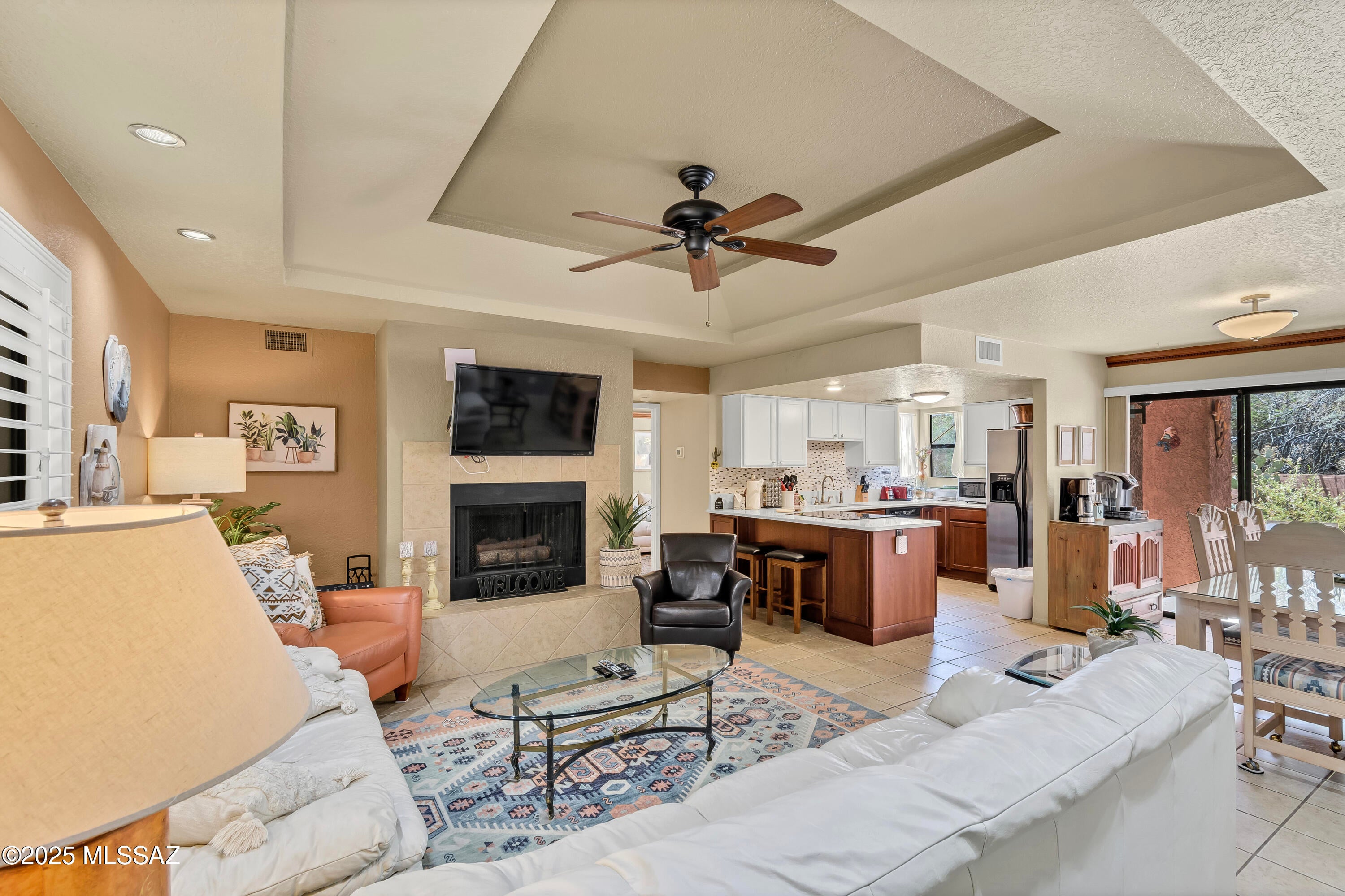 Must see condo in the highly sought after gated community of Ventana Vista, located in the Catalina Foothills. Comes fully furnished and ready for you to move right in or use as an Air BNB. Walking distance to Sabino Canyon and restaurants! Wonderful oasis with raised ceiling, private covered patio, covered parking, and 3 spacious bedrooms. Amenities include: Clubhouse, Pickleball, Pool, Fitness Room, Spa/Hot Tub, and Tennis Courts. What more could you ask for?! Hurry before this one is gone!