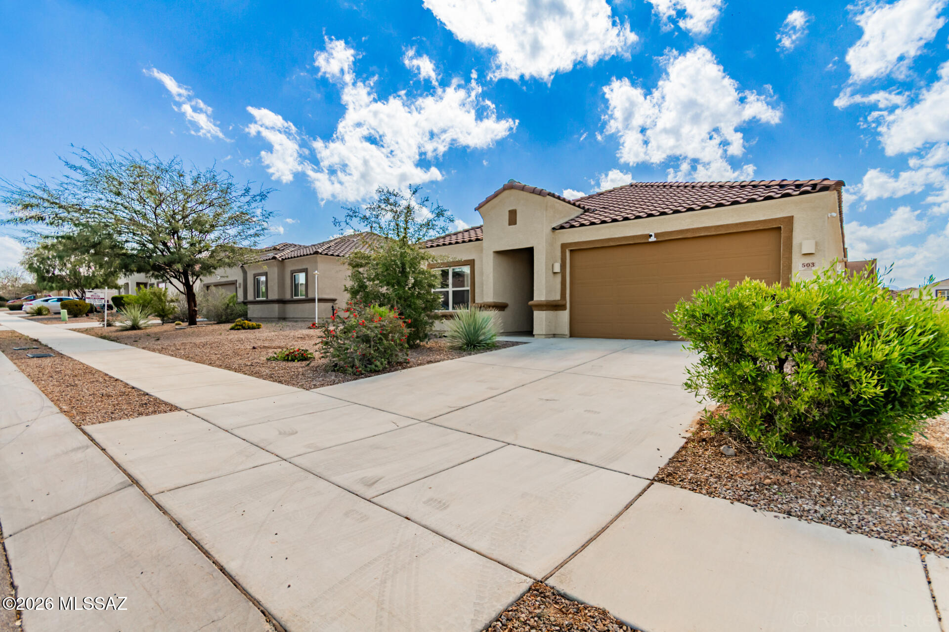 Built in 2021, this well-maintained 4-bedroom, 2-bath home offers modern comfort with a bright open floor plan perfect for everyday living and entertaining. The kitchen features granite countertops, ample cabinetry, and a nice-sized pantry for extra storage. A formal dining room provides space for gatherings, while the large primary suite offers a relaxing private retreat. Additional upgrades include a reverse osmosis system, water softener, tankless water heater, and a Vivint security system. Outside, enjoy mature landscaping and added spacing thanks to an easement on the right side of the home. A newer home with thoughtful upgrades and a functional layout, ready for its next owners.