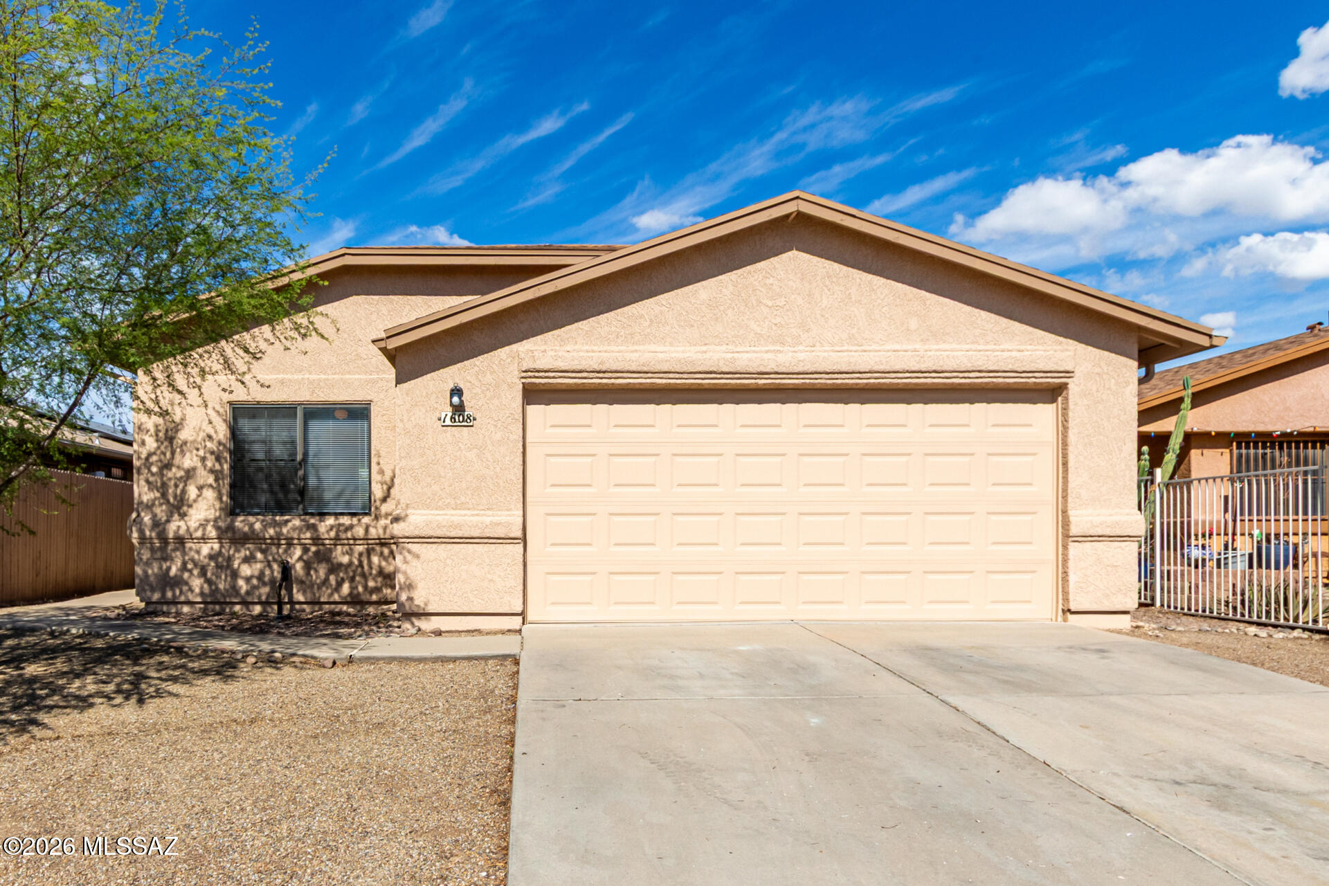 Seize the chance to be the proud owner of this adorable 3-bedroom home! Explore the inviting interior, showcasing new carpeting, tile in high-traffic areas, vaulted ceilings for an airy feel, arched passageways, abundant natural light, and soft paint that works great with any decor choice. Right off the entrance, you'll have a den, perfect for an office. The well-appointed kitchen features plentiful storage cabinetry, a spacious peninsula, and new built-in appliances. Get a good night's sleep in the primary retreat, offering a practical walk-in closet with mirrored doors and a full ensuite. The backyard is waiting for your personal touch, including a covered patio. The water heater and the garage door are new! Hurry up, this one won't last!