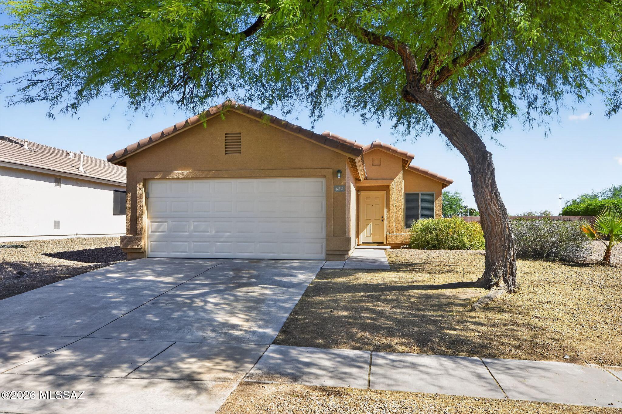 This spacious 3-bedroom, 2-bathroom home is nestled in a quiet, well-maintained neighborhood, offering a peaceful retreat with great curb appeal. The exterior is constructed with a durable stucco and wood-frame design, ensuring both stability and a classic aesthetic. Inside, the home features ceramic tile flooring throughout, providing a cool, low-maintenance, and carpet-free environment that is perfect for easy cleaning.
The kitchen is efficiently designed with practical laminate countertops, offering plenty of workspace for daily cooking. With its generous room sizes and serene location, this property is a fantastic find for those seeking a move-in-ready home in a stable community.