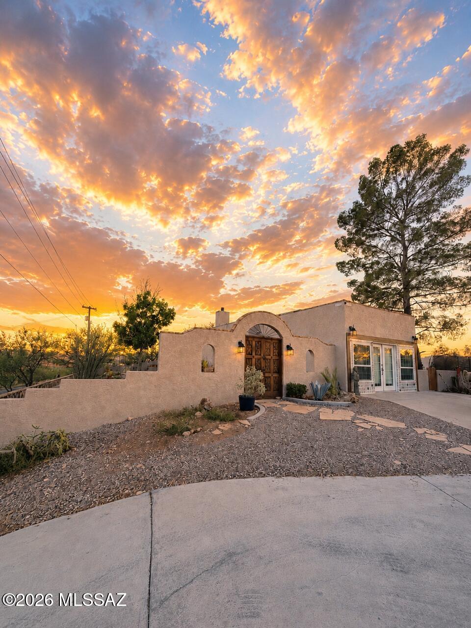Nestled on a 1.55 Acre picturesque hillside, this stunning hacienda-style estate offers breathtaking panoramic views in every direction and truly one-of-a-kind living experience. Featuring 1147 sq ft of enclosed patio with sparkling pool to enjoy all year round for entertaining as your private retreat. Designed for comfortable living, this 2616 Sq Ft home features 4 bedrooms and 3 bathrooms designed with timeless charm and comfort in mind. Whether you are having morning coffee in the courtyard or an evening bbq on the back patio, this charming private estate is truly a private sanctuary and a must see. This is your opportunity to own a piece of Arizona paradise in the heart of Rio Rico.