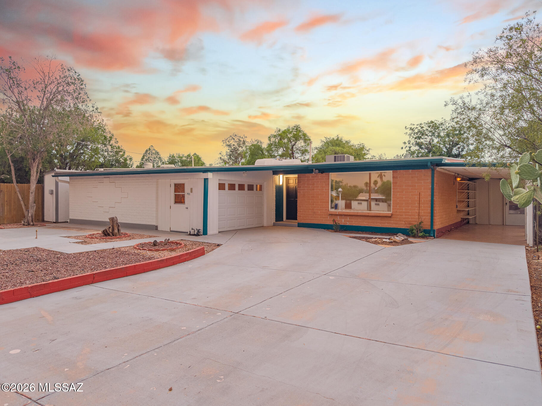 Beautifully updated 4 bed, 2 bath home with fresh paint, new carpet, updated lighting, reverse osmosis system, dual pane windows, instant hot water heater, water softener and an upgraded kitchen. Major improvements include a brand-new AC installed 07/08/2026 and has a 2 year warranty. The home also features a garage, which is a rare find for this neighborhood. Plus a 240 sq ft versatile bonus room ideal for an office, playroom, or extra living space. The spacious back yard offers a true oasis with a large pond and fountain, raised flower beds, a ramada, and high privacy fencing. A true gardener's paradise! Move-in ready with modern updates and standout outdoor living!