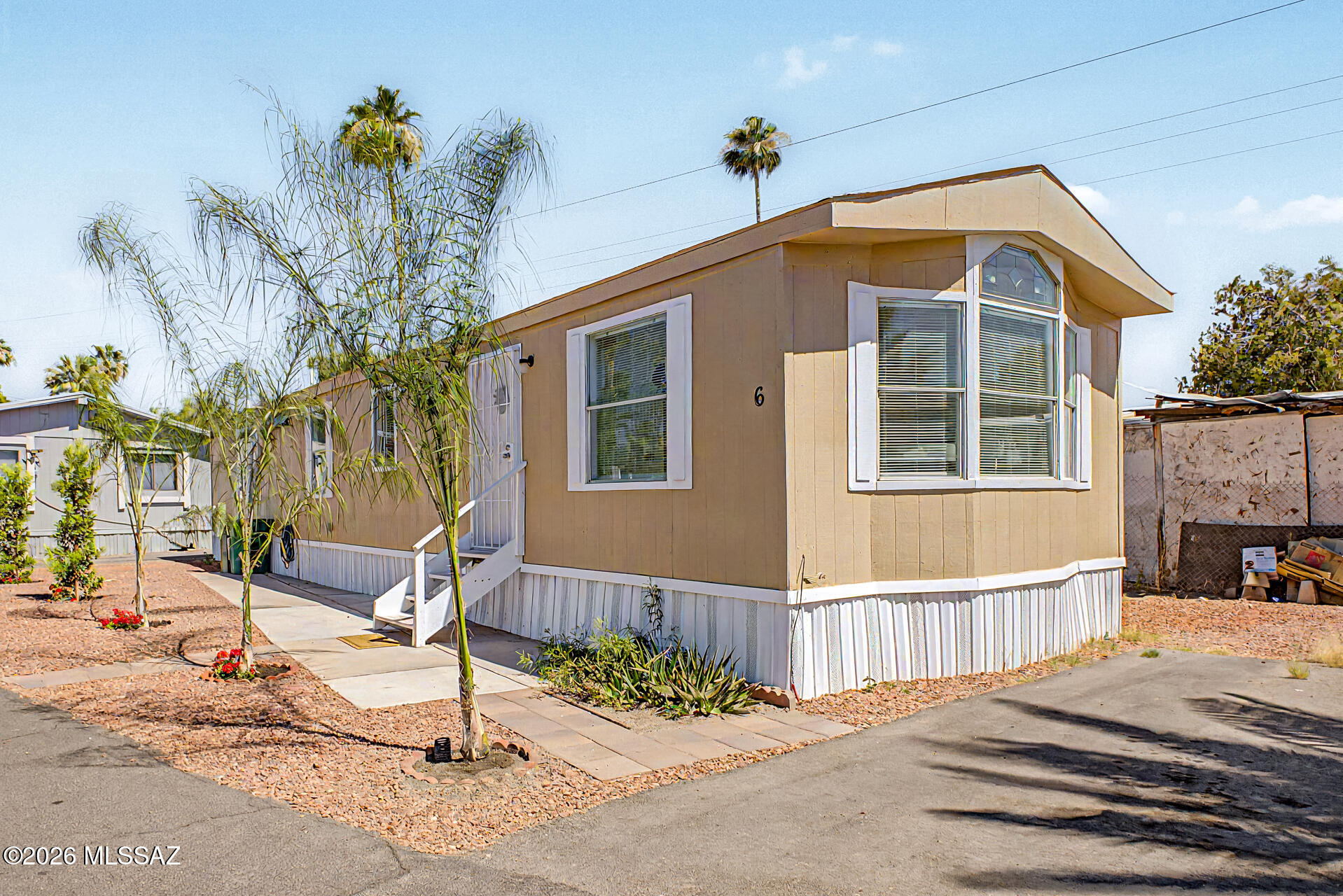 Charming and well-maintained 3-bedroom, 2-bath manufactured home. Bright and inviting floor plan with a spacious living area, attractive landscaping, and pride of ownership throughout. Conveniently located within a well-kept community and ready for its new owner. Residents enjoy access to a community pool.