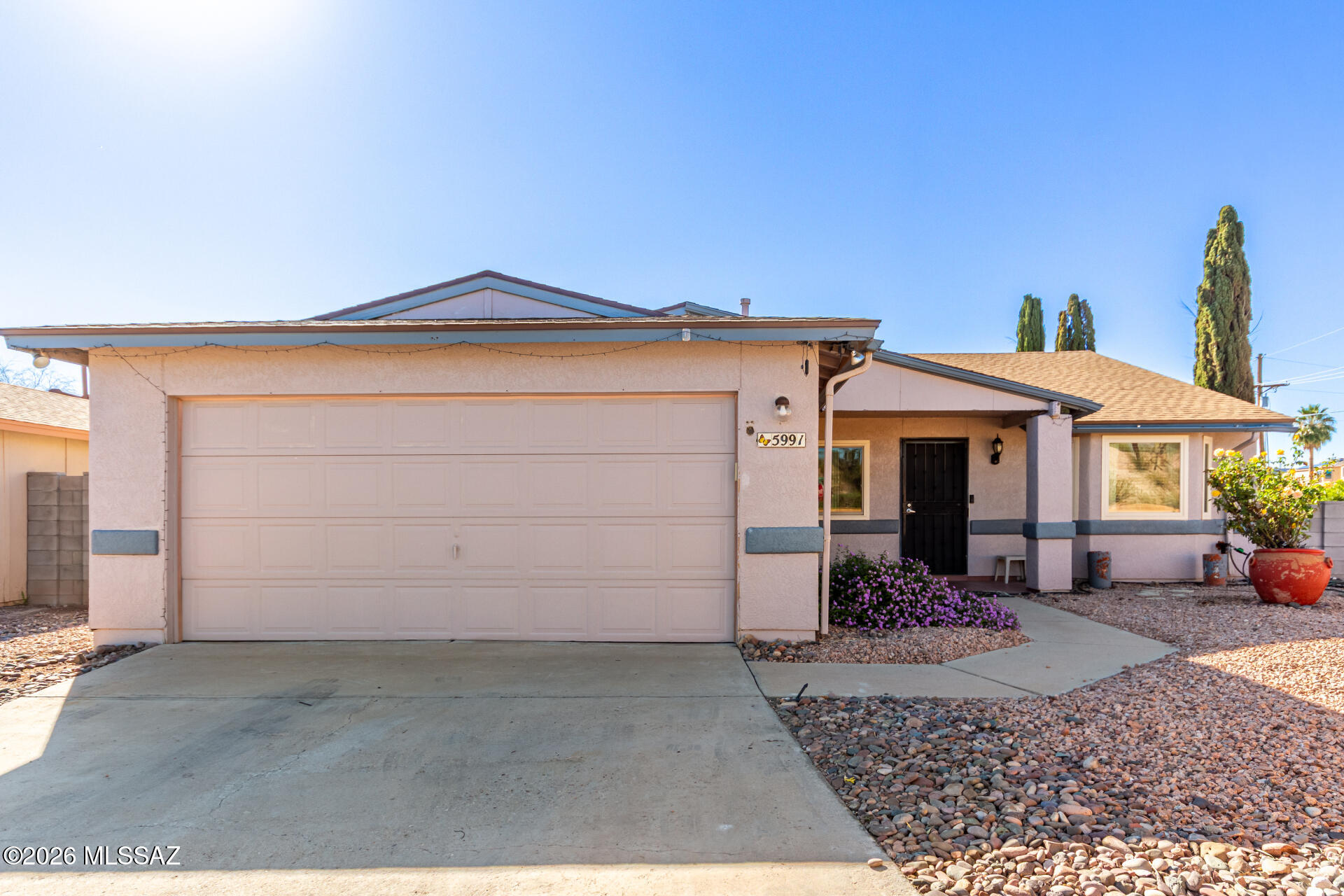 The search is now over! This is your chance to own this charming 4-bedroom corner lot property featuring an appealing open layout with vaulted ceilings, a soothing palette, blinds, and wood-look flooring. Gather loved ones in the family, complete with a fireplace for cozy evenings. The well-appointed kitchen comes with ample wood cabinetry and sleek stainless steel appliances for a delightful cooking experience. The main bedroom includes a built-in closet with mirrored doors that enhance the sense of space and a private bathroom for added comfort. Venture out onto the sizeable backyard, showcasing a covered patio, a large shed that provides additional storage, and abundant space for crafting your dream outdoor oasis. Don't miss out on this fantastic opportunity!