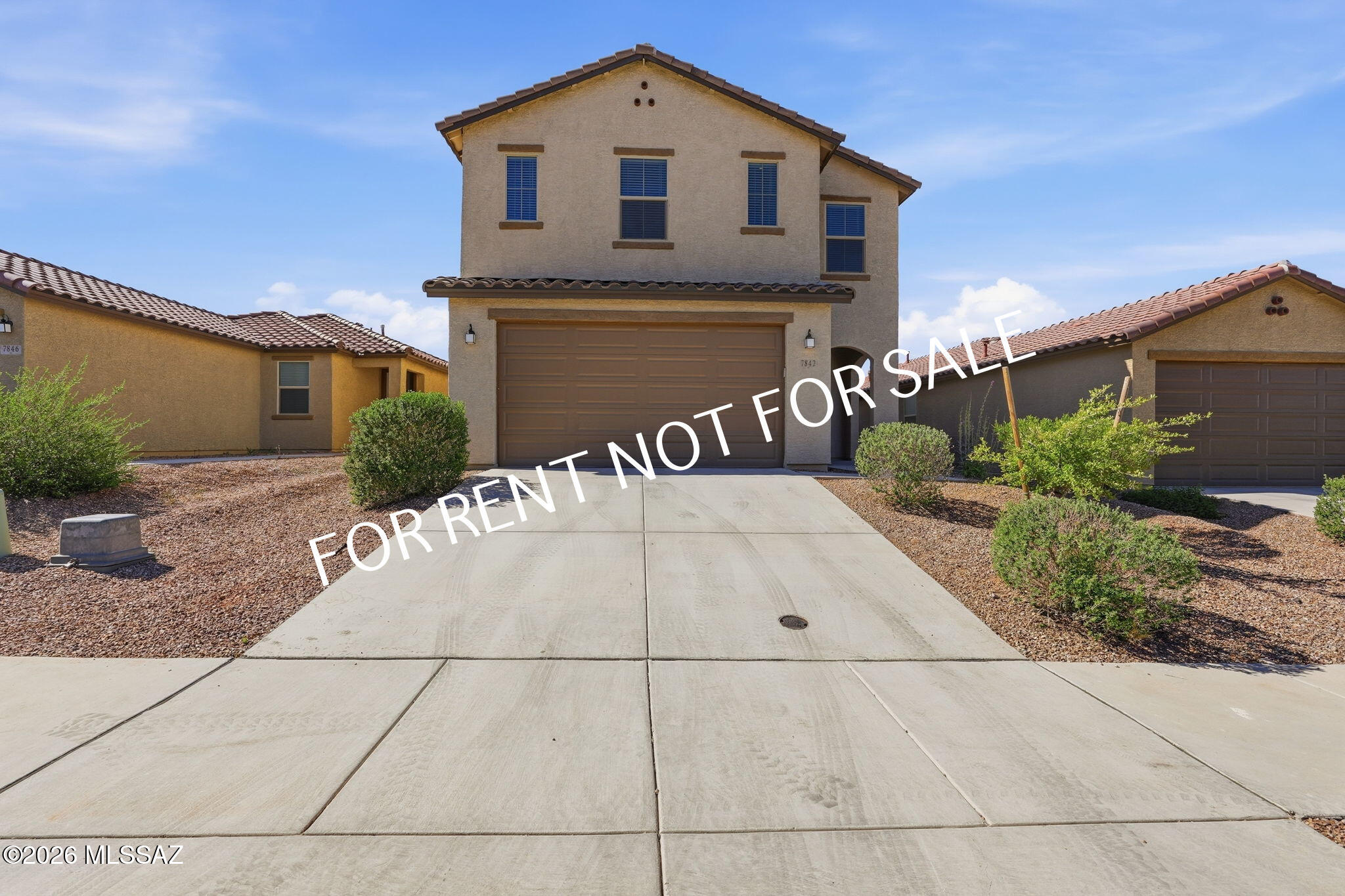 Built 2022 - 5 BED 3 BATH + DEN -  2685 SQ.FT. D***2 Year Lease At $2,595.00/mo. or 1 Year Lease At $2,695.00/mo.*** Discover this stunning, beautifully upgraded, contemporary home in the gated section of the highly sought-after Rocking K Community of Tucson, AZ. With 2,685 sq. ft. of thoughtfully designed living space, this residence combines modern finishes with the serene charm of the desert. The home features an inviting great room, neutral colors throughout, tile and carpet. Custom Tile Work with unique patterns in the laundry room and all three bathrooms. Adjacent to the great room, you will find a well-appointed upgraded gourmet kitchen equipped with ample gray cabinetry, granite countertops, white subway tile backsplash, crown molding and stainless-steel appliances. Appliances included: refrigerator [ 2nd refrigerator in garage- as is ], dishwasher, gas oven/stove, built-in microwave, washer/dryer. Enjoy improved water quality throughout the home with a home water softener system, adding comfort and long-term value. Insulated and finished garage, low-maintenance backyard with covered patio & turf. Guest bathroom with full bathroom downstairs. A lighted staircase leads to all bedrooms upstairs.  Master suite with large walk-in closet and master bathroom with dual sinks and walk in shower. Located in the gated section of Rocking K Ranch, residents enjoy playgrounds, biking and walking trails, and top-rated schools in the Vail School District. Outdoor enthusiasts will love being adjacent to Saguaro National Park, while the Rincon Valley Farmers and Artisans Market is just minutes away. Enjoy the convenience of being just a short drive from the Rocking K Community Park, perfect for outdoor activities and relaxation. This home perfectly blends modern elegance with functional living, offering everything you need for comfort, style, and entertainment. Pets subject to approval. Dogs under 30 pounds. Cats and bigger dogs subject to consideration.
Please visit our website for SECURITY DEPOSIT, PET RENT & NON-REFUNDABLE PET FEE , OTHER FEES INFORMATION.
